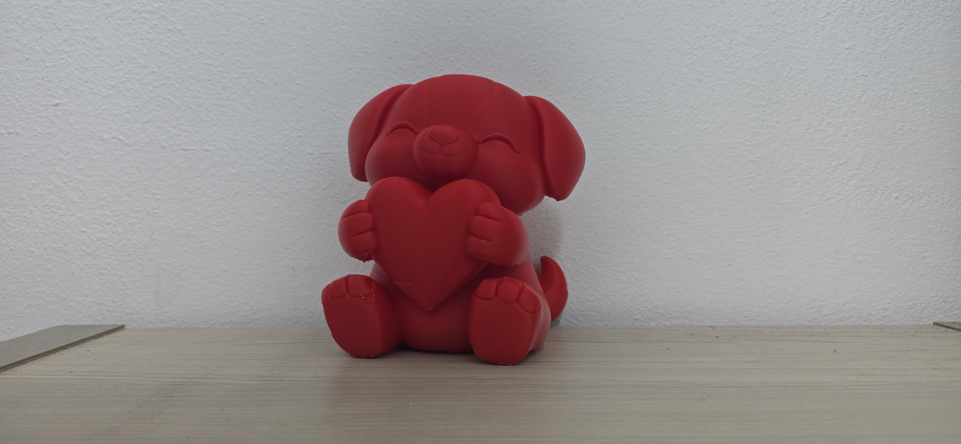 Cute Valentine Dog Puppy with Heart Statue