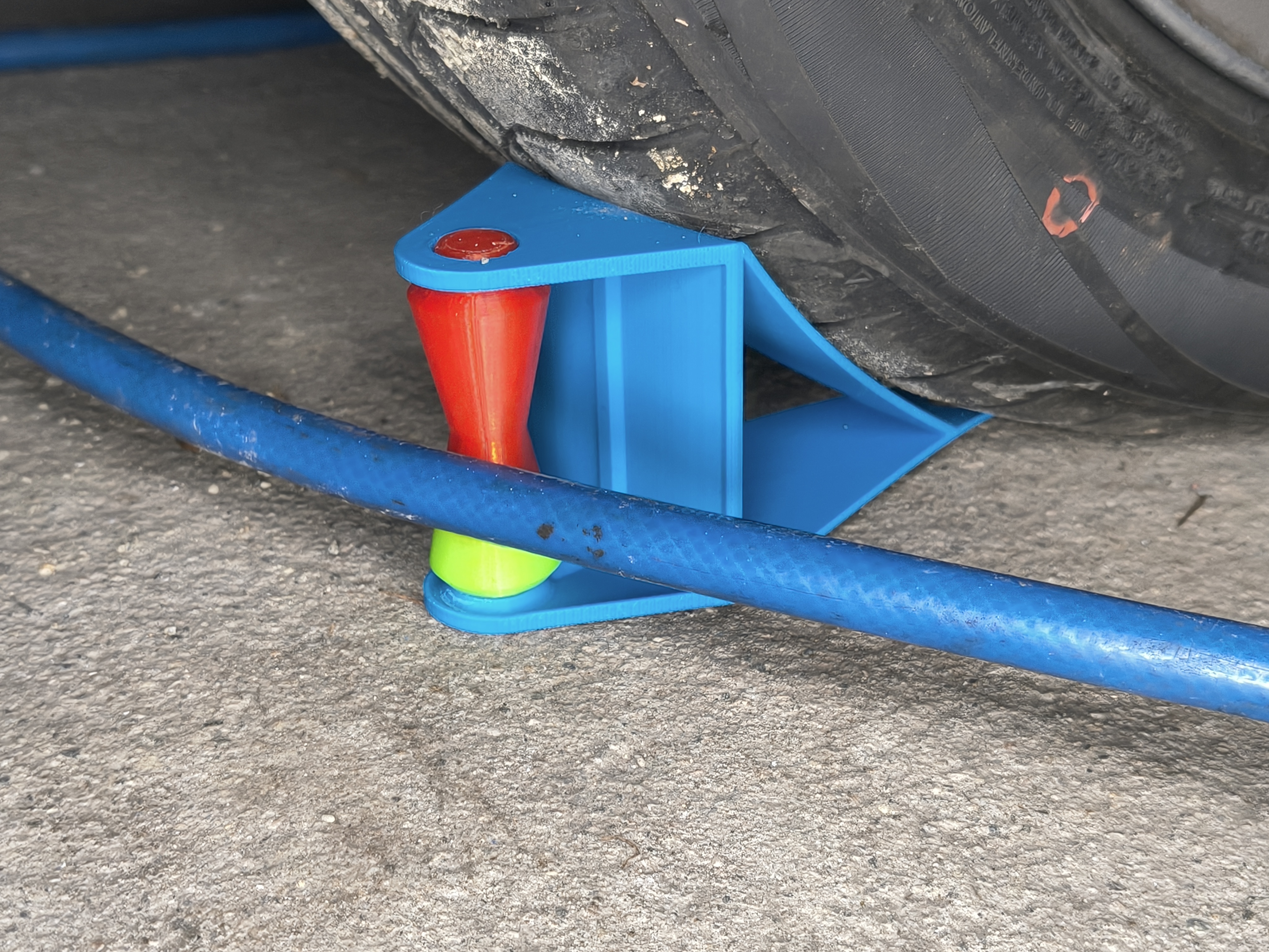 Hose guide roller - avoid hose snagging car tire for washing or air hose