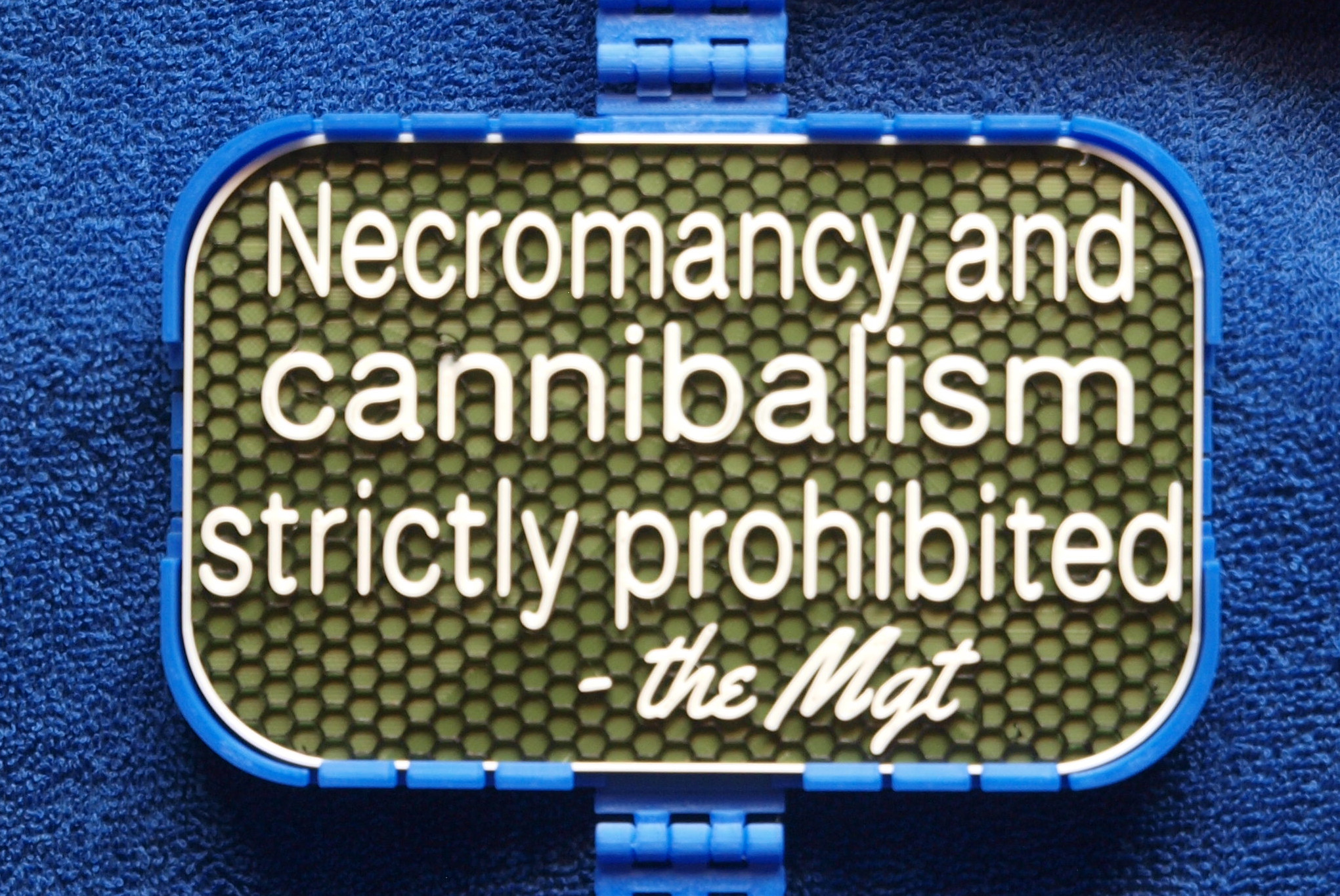 Mgt Sign: Necromancy and cannibalism prohibited