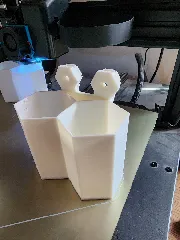 Honeycomb storage wall Improved Storage cup design