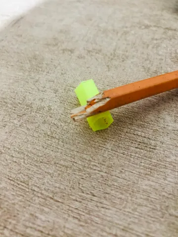 A hex pencil cap for a snapped pencil (singular)