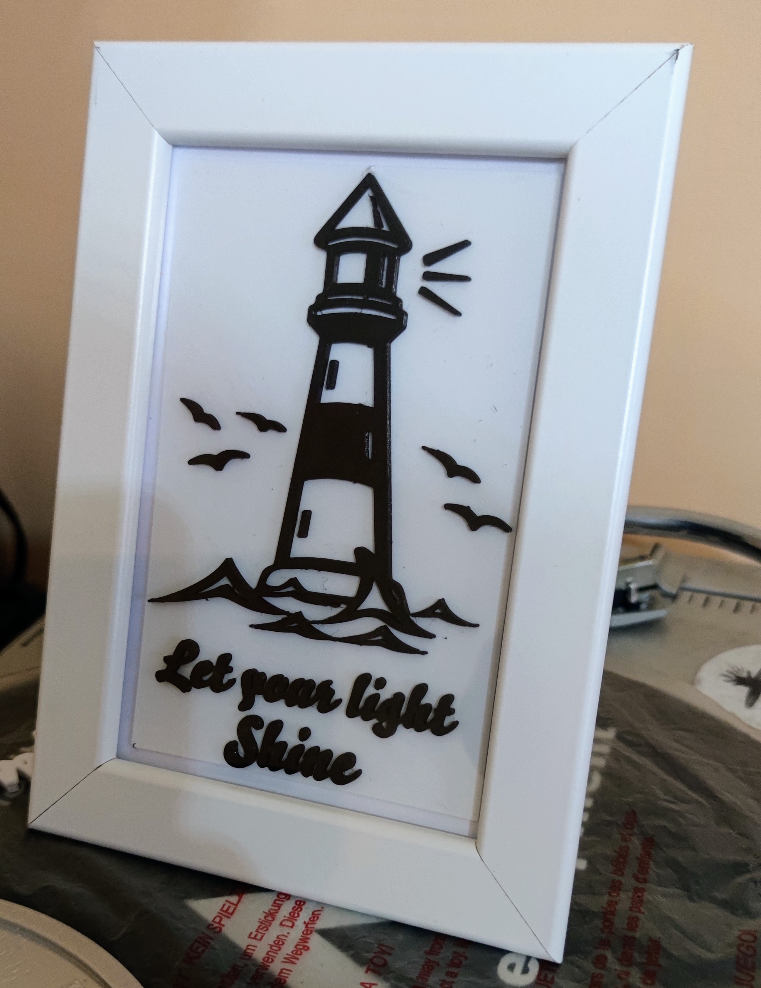 let your light shine two-tone lighthouse logo
