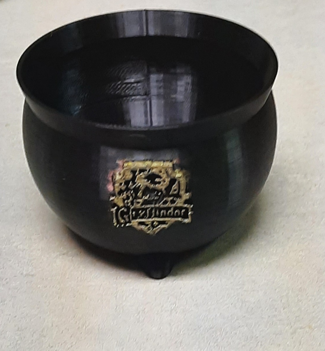 Harry Potter style cauldron with Gryffindor crest