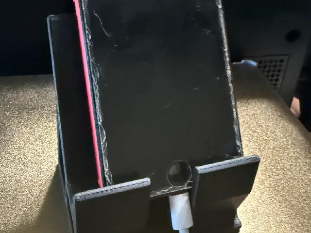 Futura Phone Stand: Lightweight Truss Design with Cable Slot