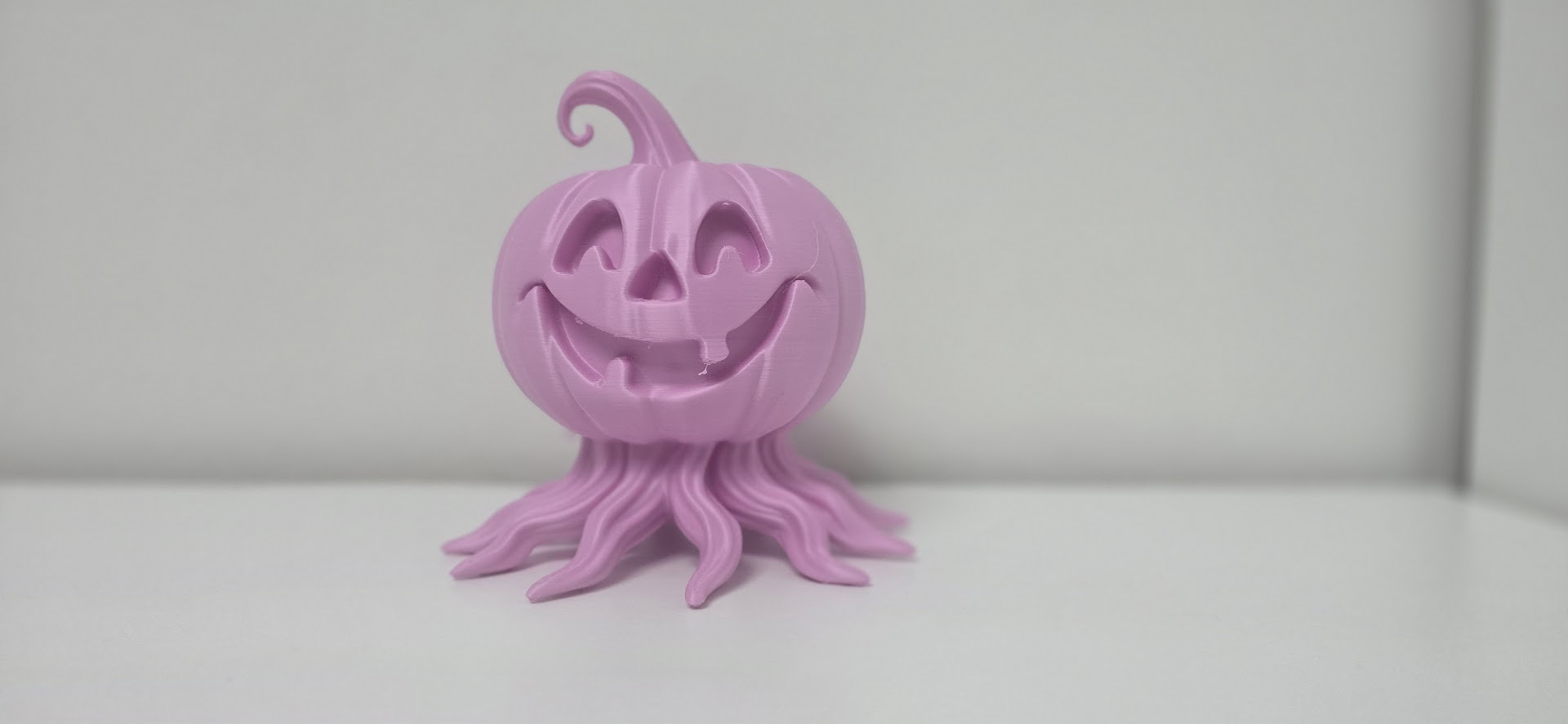 Halloween Smiling Pumpkin with Roots
