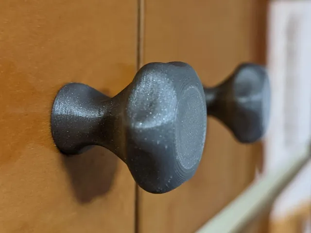 Ergonomic cabinet knob / Úchyt na nábytek