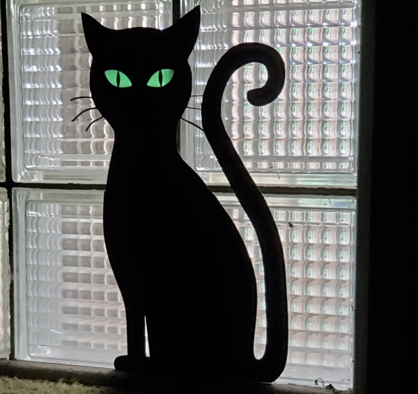 Glowing Eye Cat Silhouette