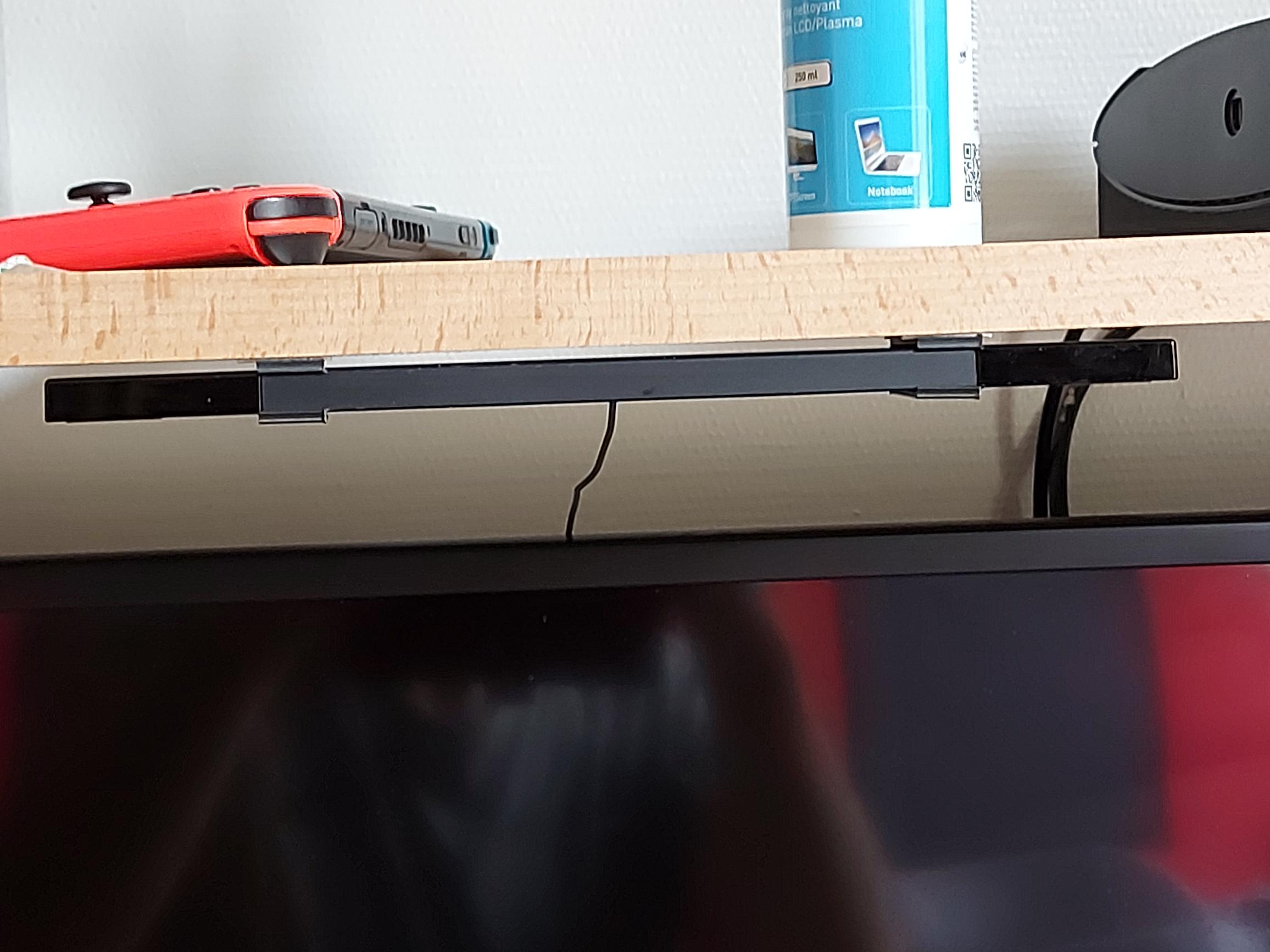 Wii sensor bar holder