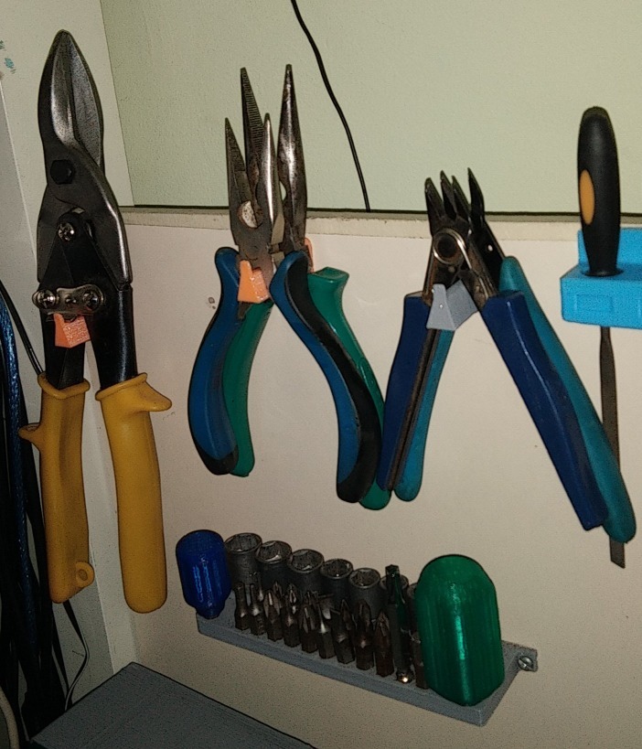 A Simple strong holder for cutting pliers nose pliers and cutters