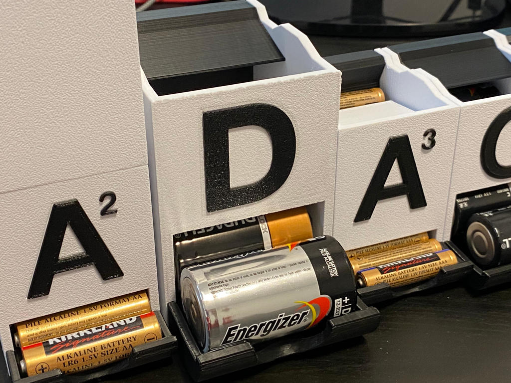 Miniatura 2 do modelo 3D Stackable D-Battery Holder