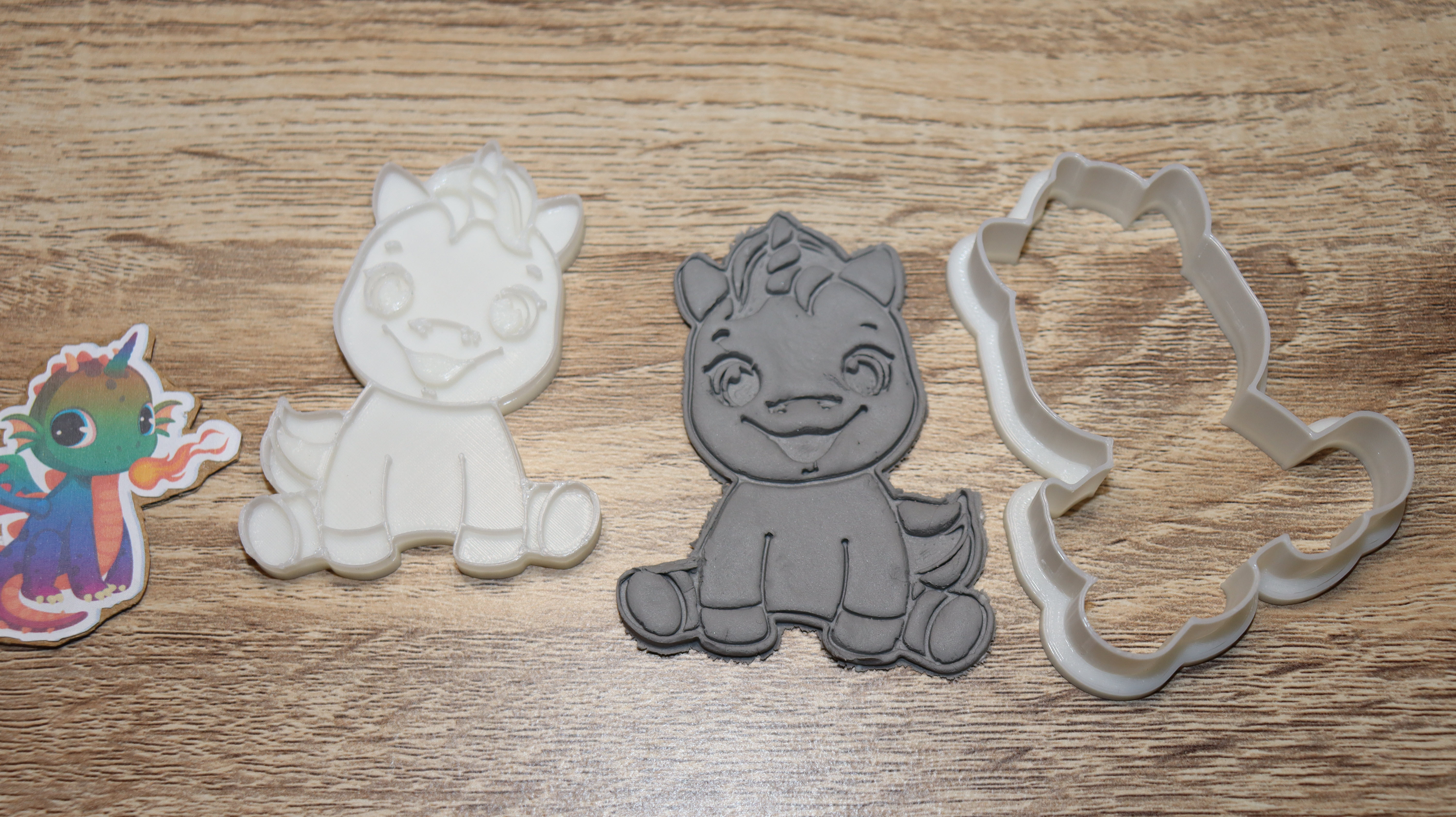 cookie cutter unicorn smiling sitting