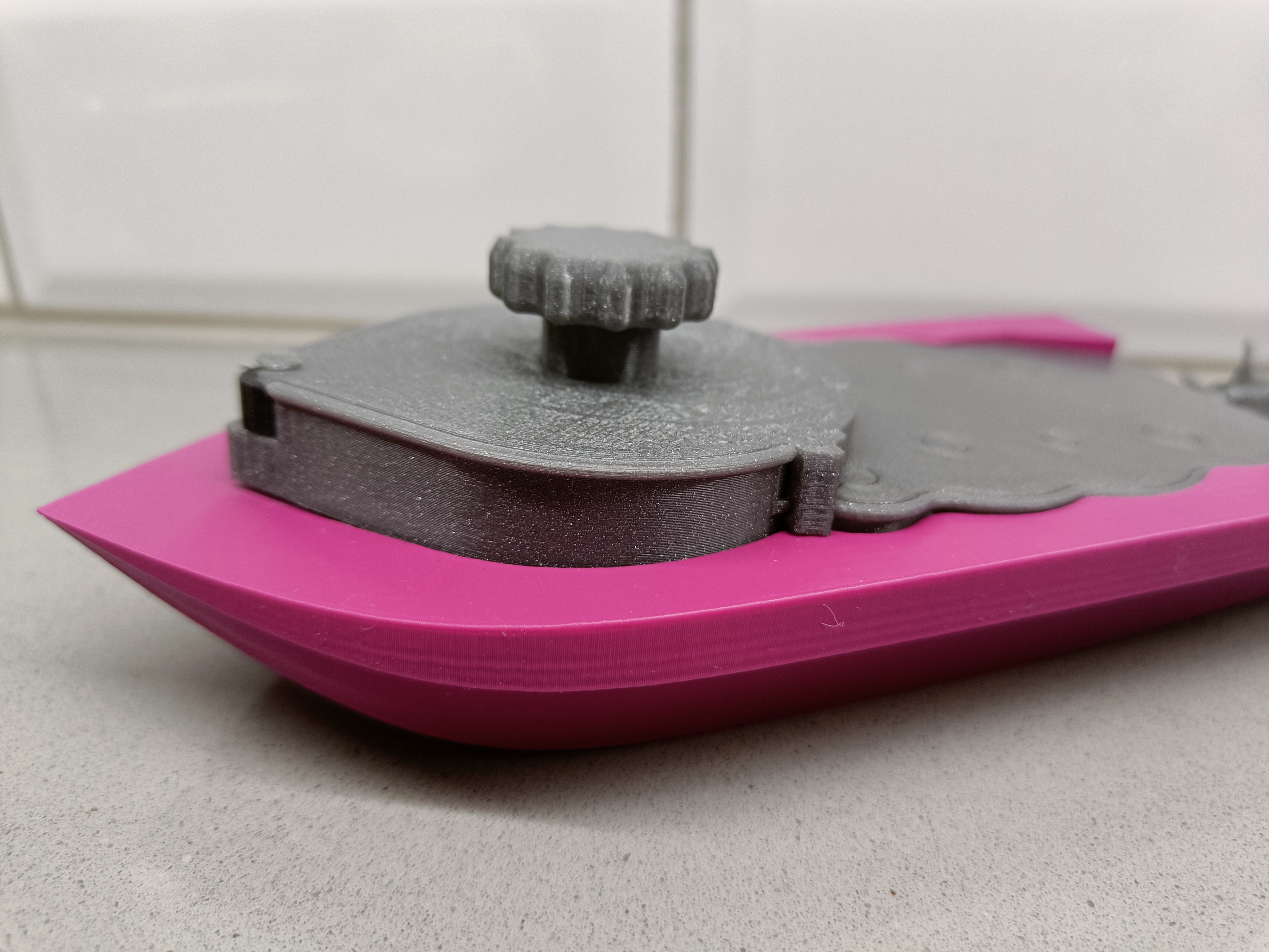 Mini wind-up boat remix: improved spring cover