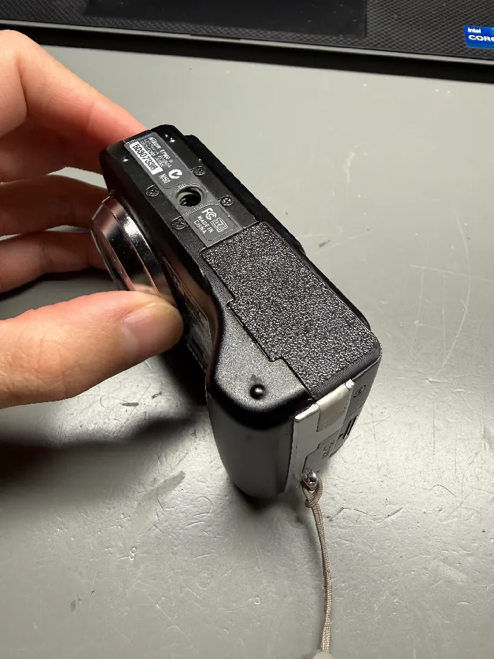 Nikon Coolpix 4200, 5200, 5900, and 7900 Battery Cover Door
