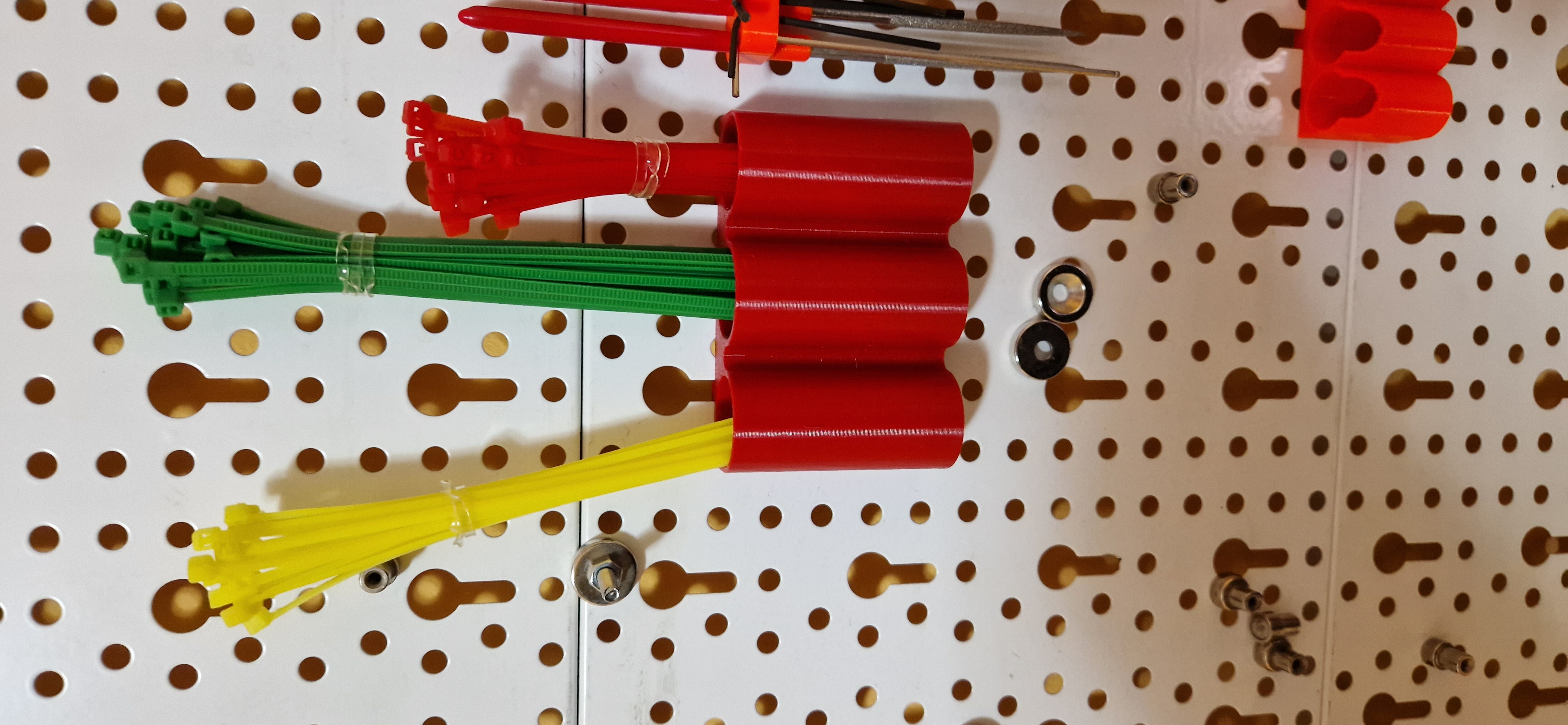 EuroTegometall pegboard with keyhole pattern by Alexandru Hauzman