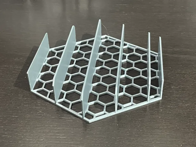 Fernbedienungs-Organizer mit Wabendesign