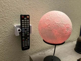Gravitationally Controlled Remote Control Holster