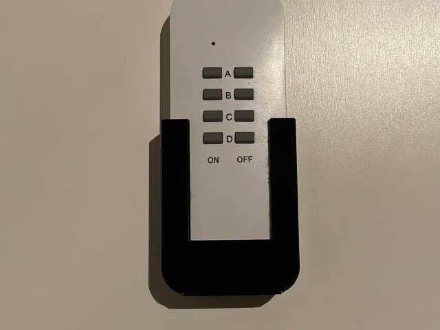 Magnetic remote holder