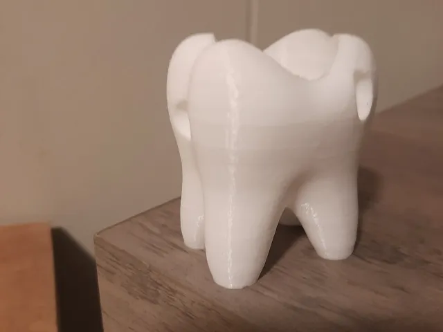 Cavity tooth ......Tooth Brush Holder