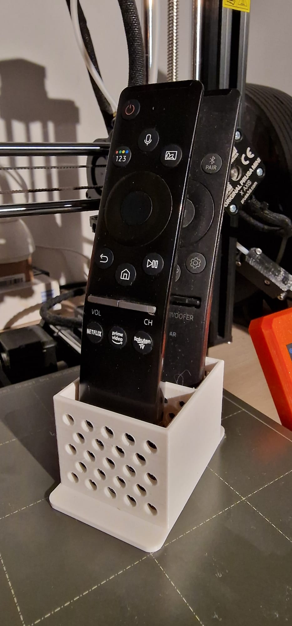 Double remote control holder with holes