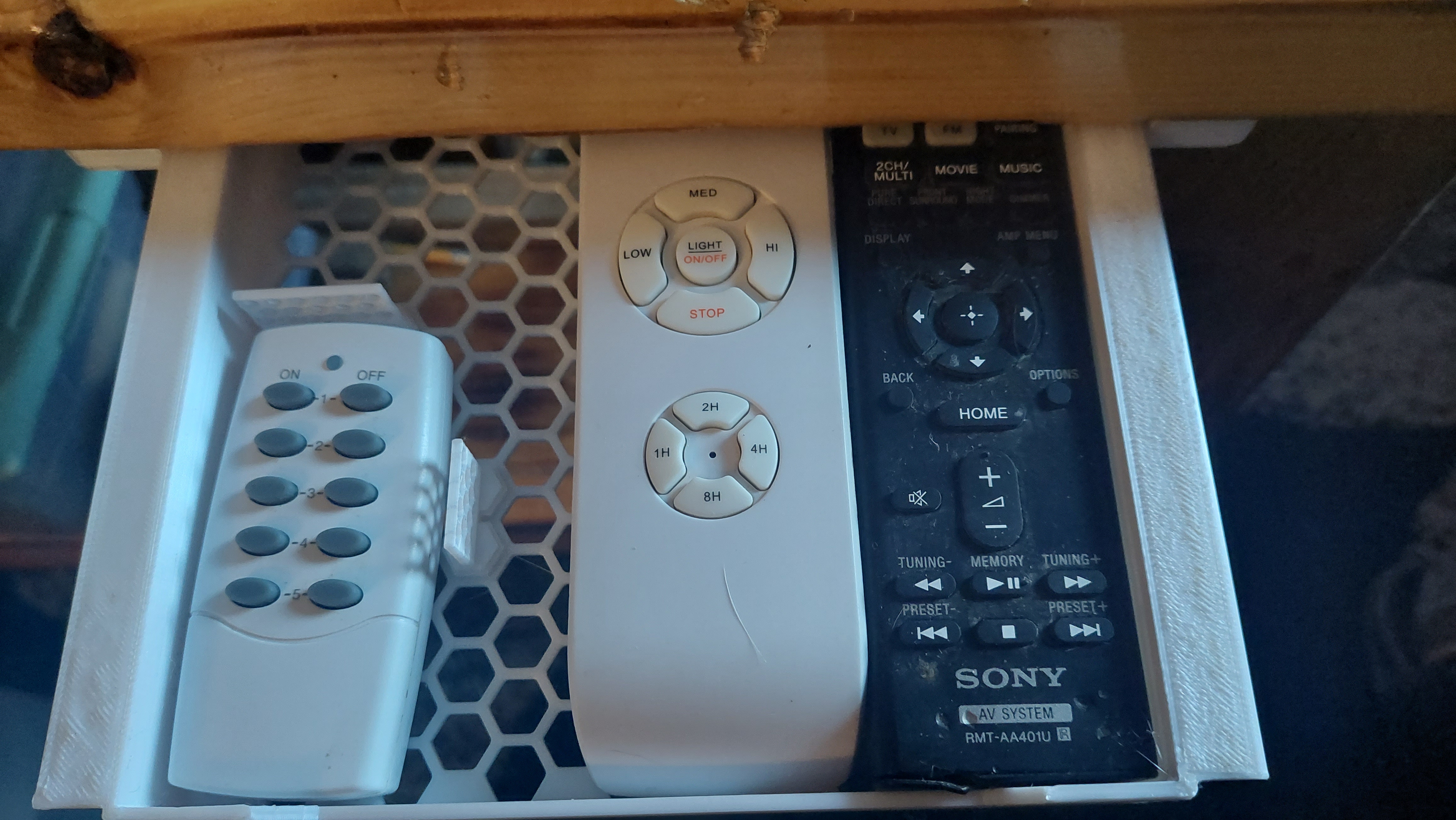 Mashup under table remote control basket.