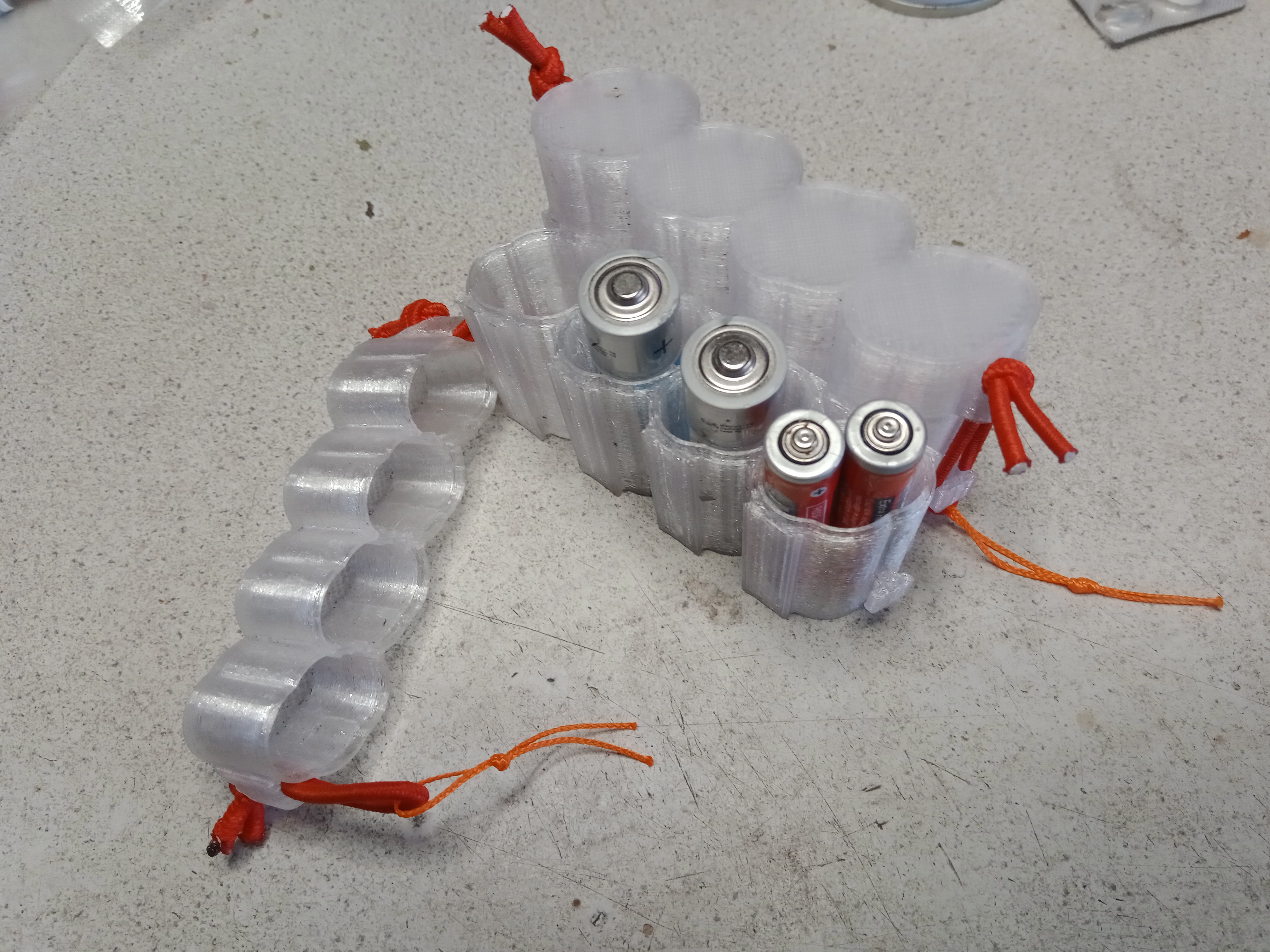 Stackable battery box for AA and AAA cells