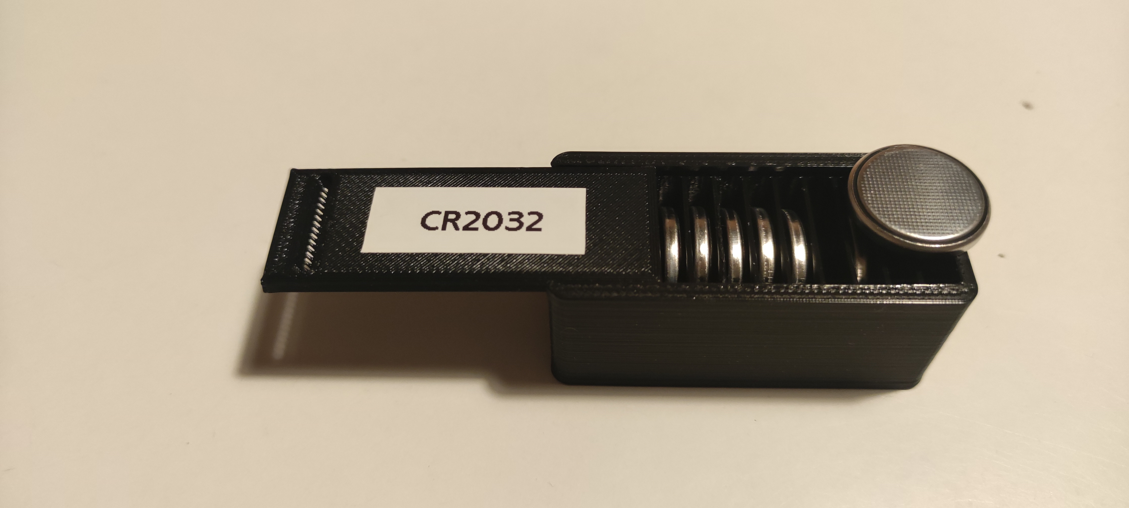 Miniatura 3 do modelo 3D Parametric battery (button cell) storage box
