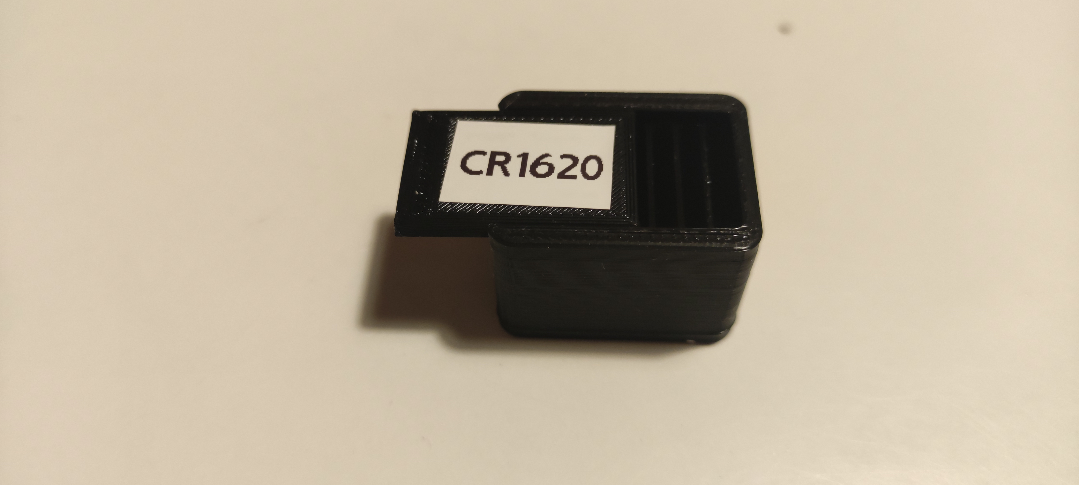 Miniatura 4 do modelo 3D Parametric battery (button cell) storage box