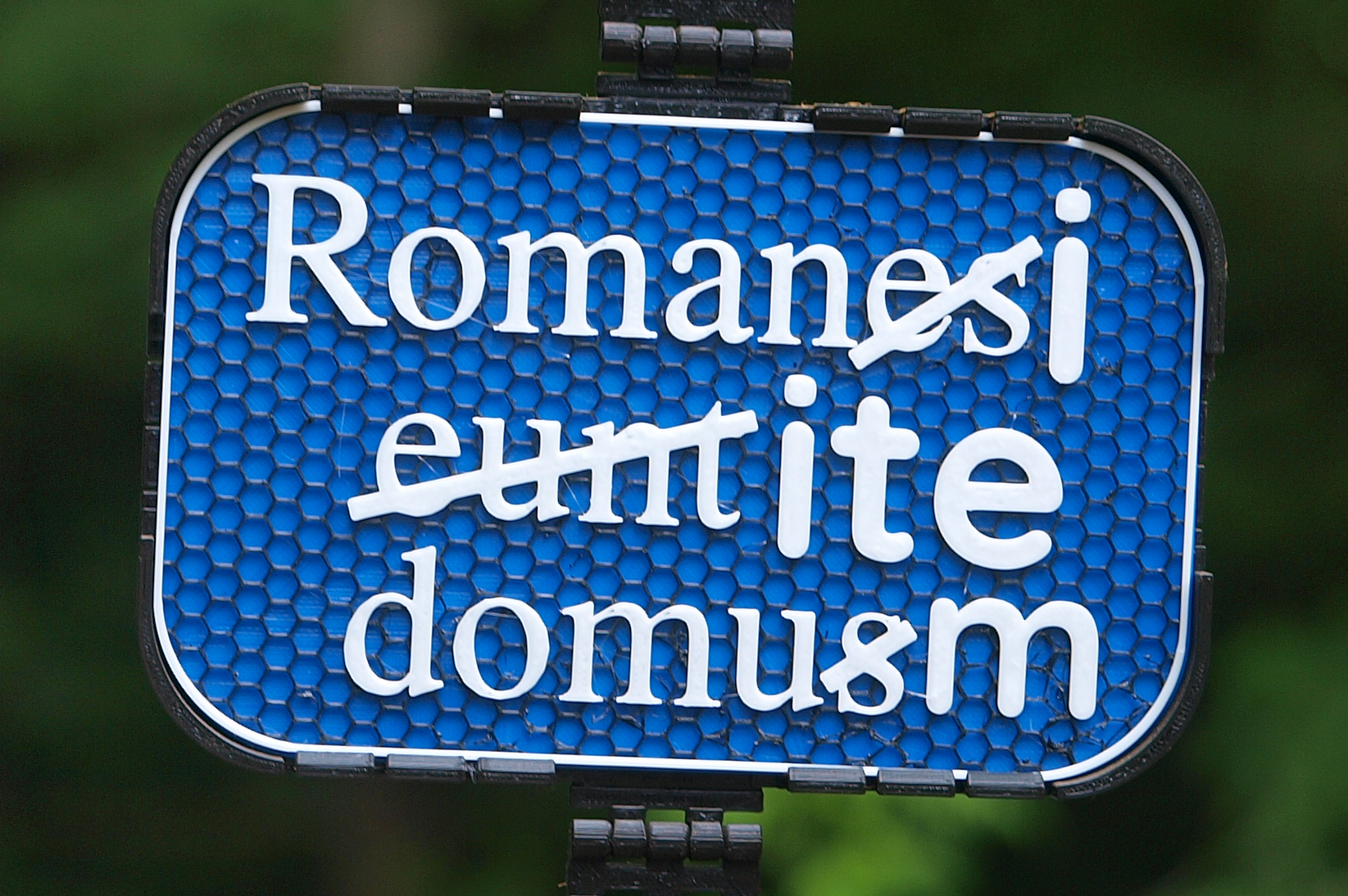 Romani ite domum sign