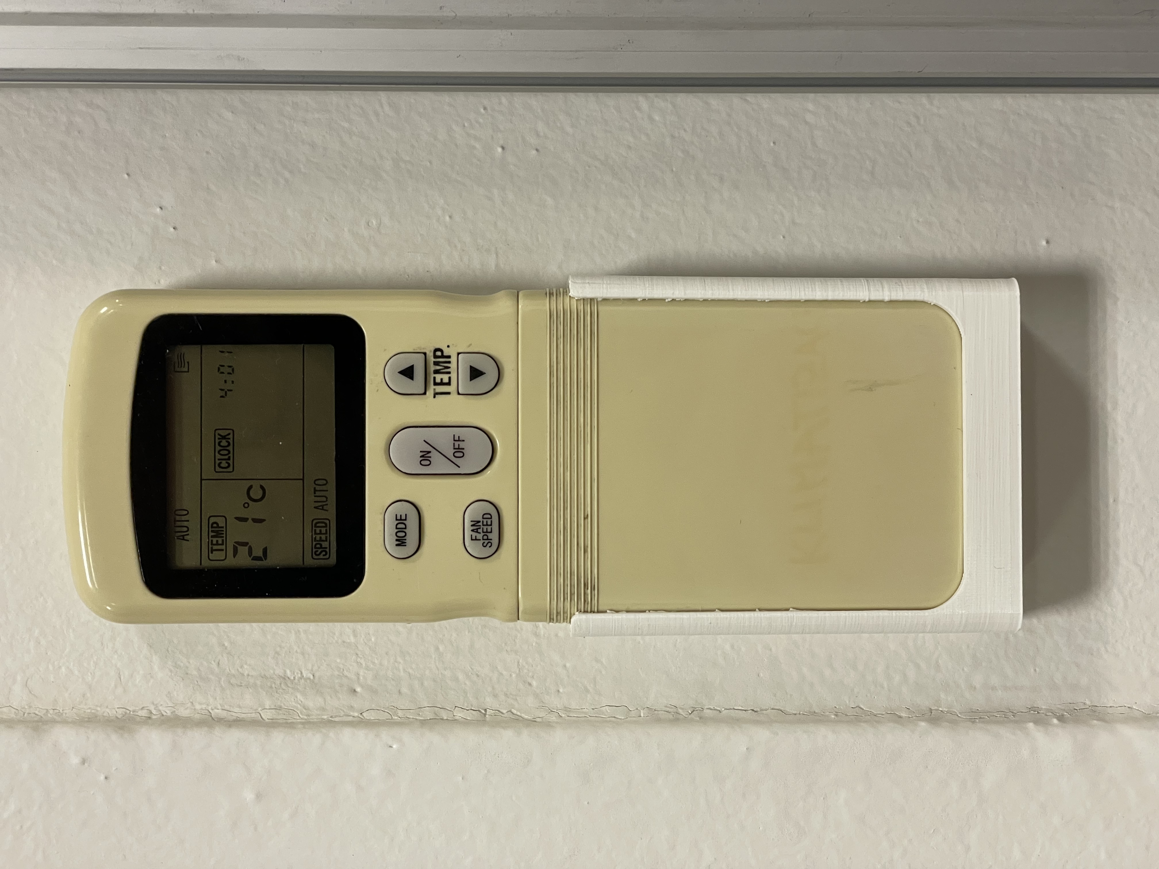 Midea AC remote holder