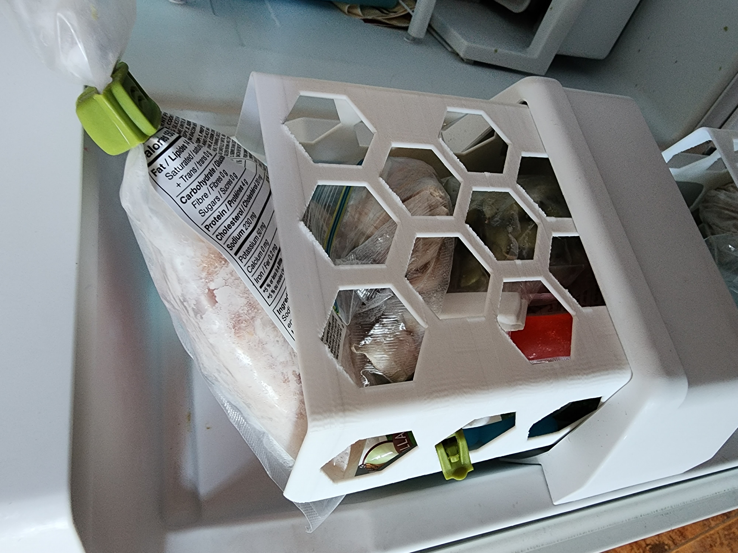 Freezer side baskets for a Whirlpool sidebyside refridgerator model