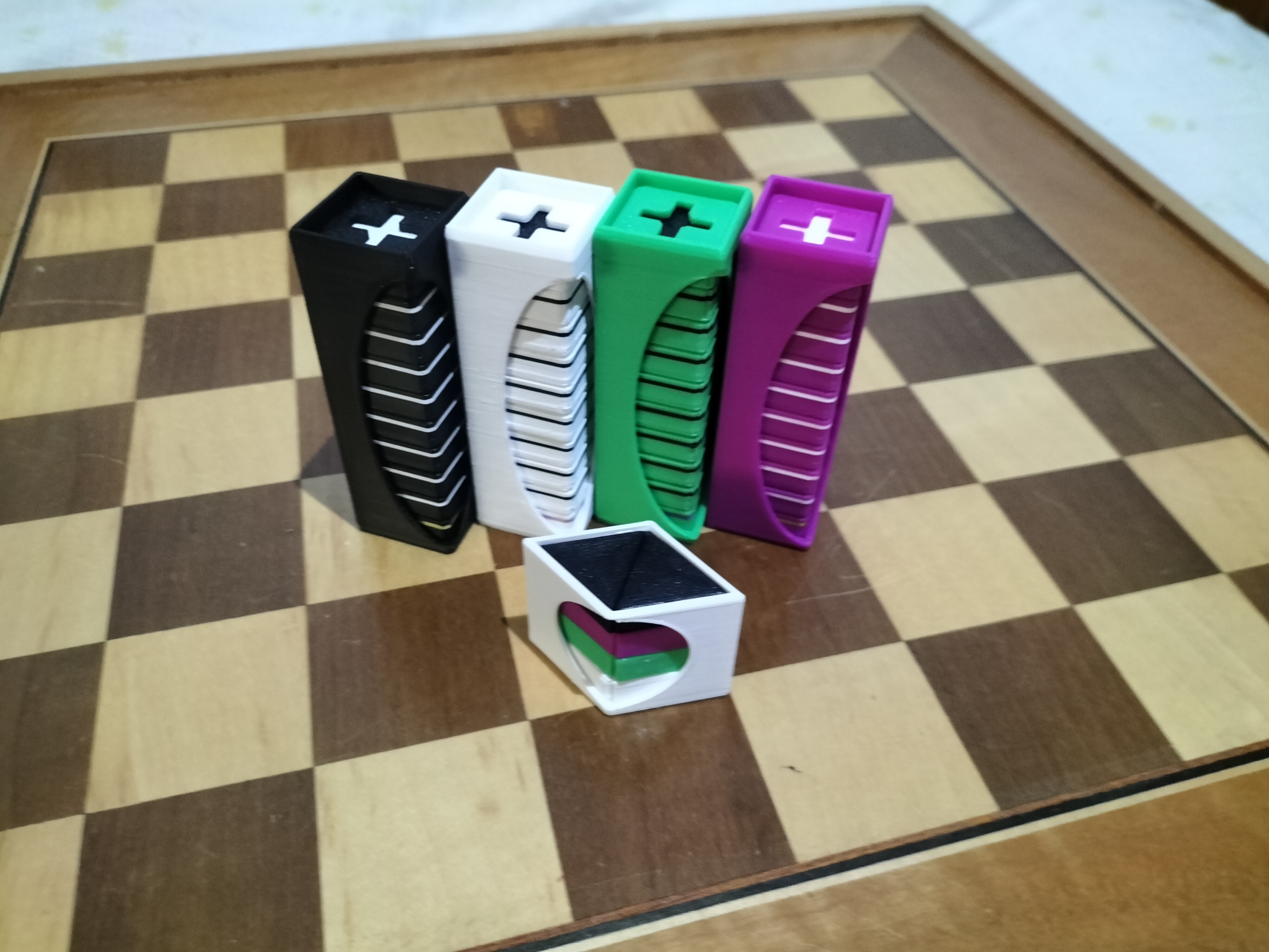 Set of pieces for four-player 8x8 board games