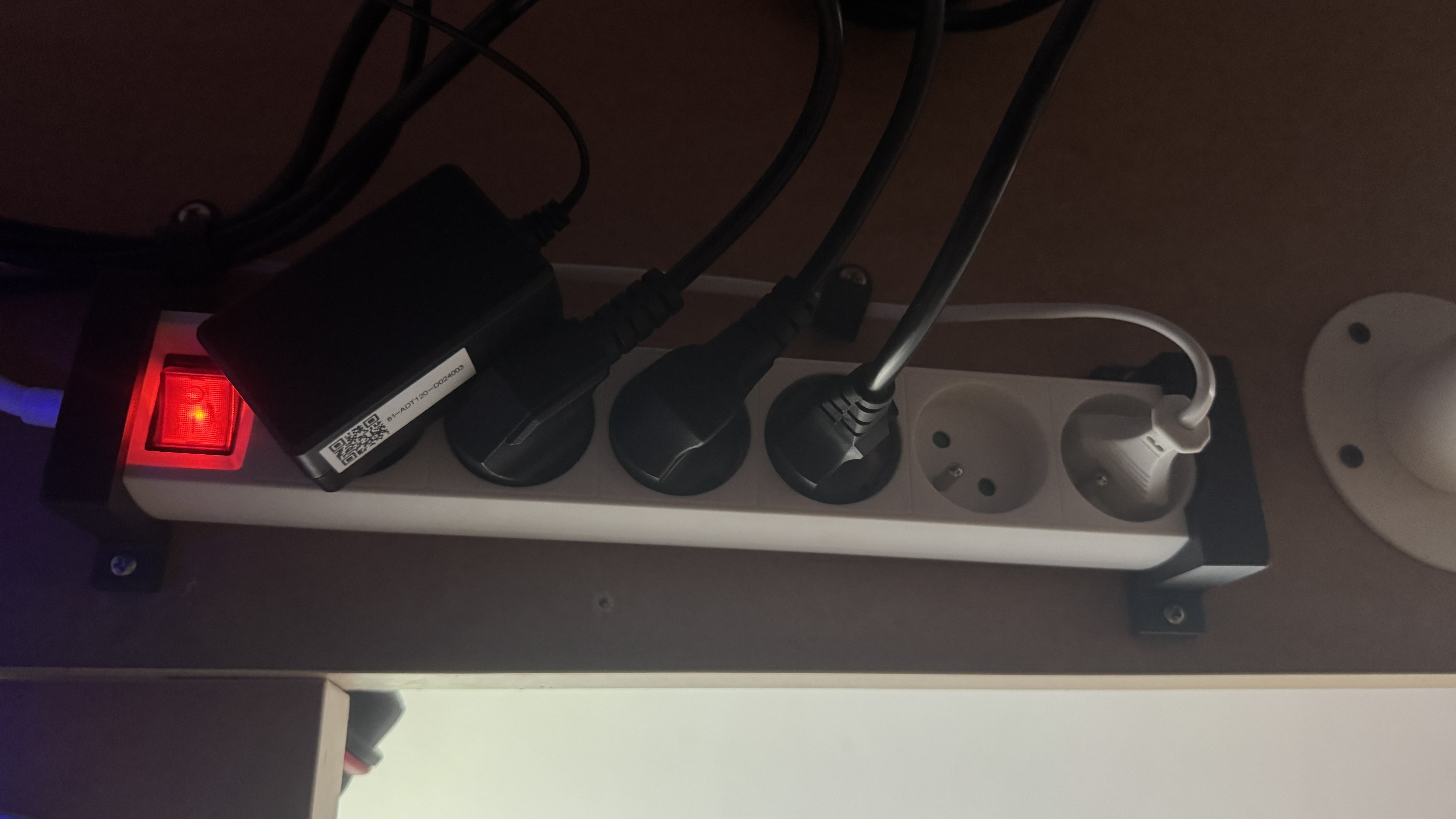 Power strip under table holder