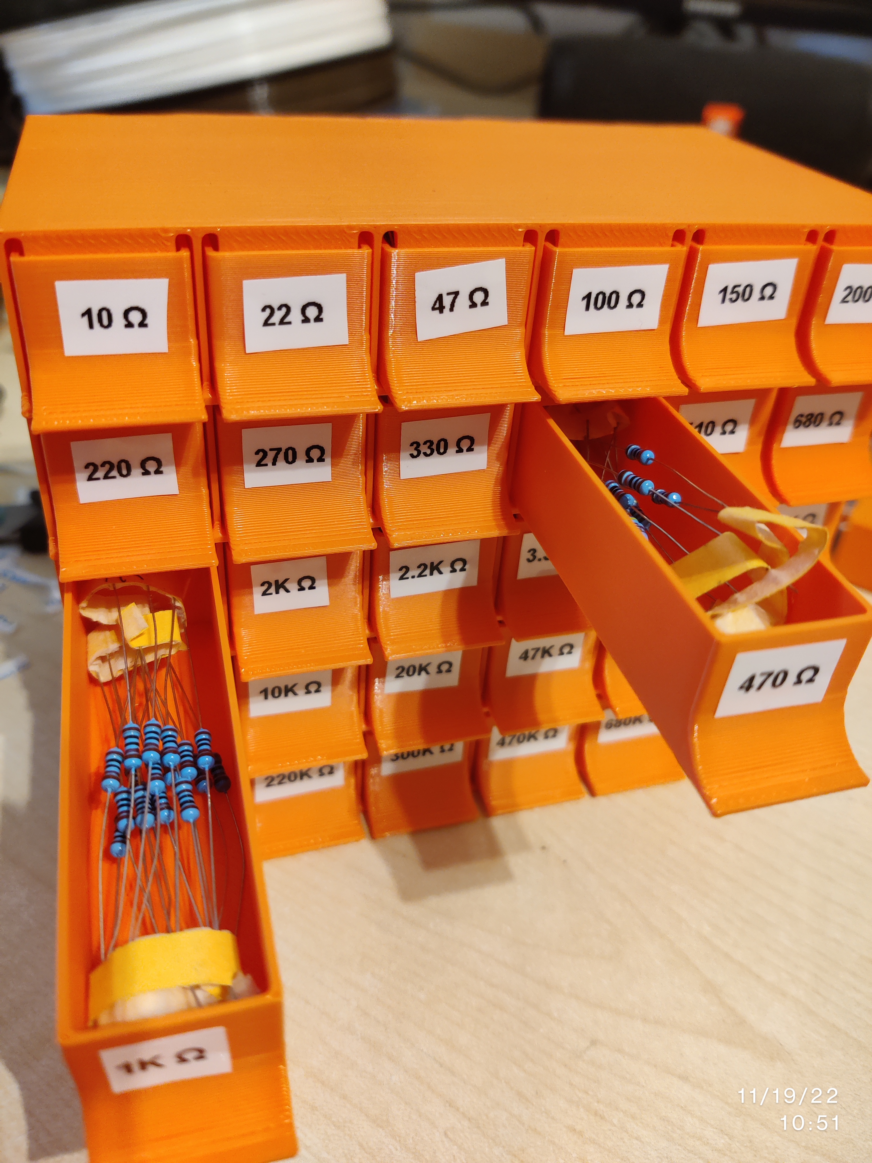 Resistor storage box with stoppers