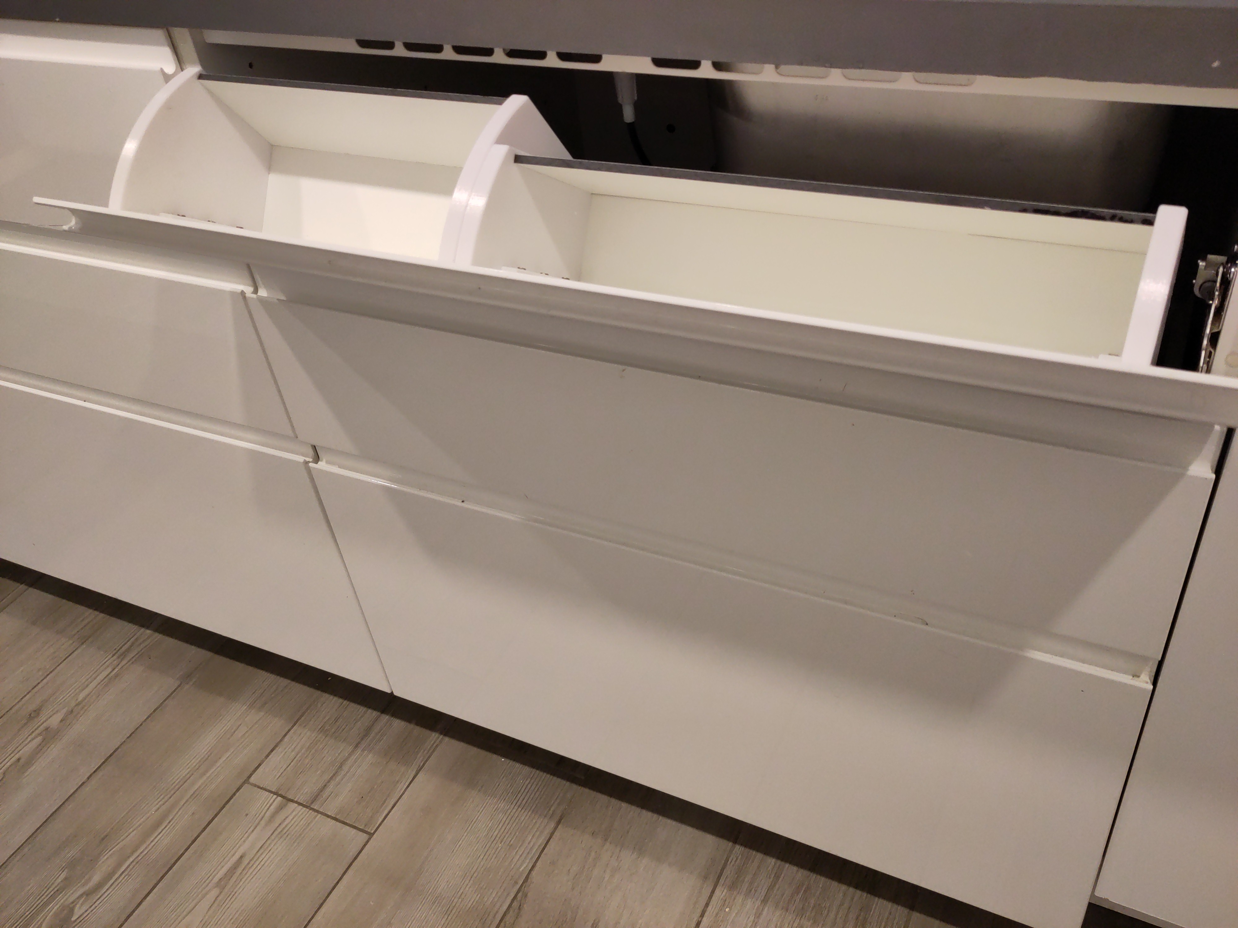 Tray for tilt-down drawers