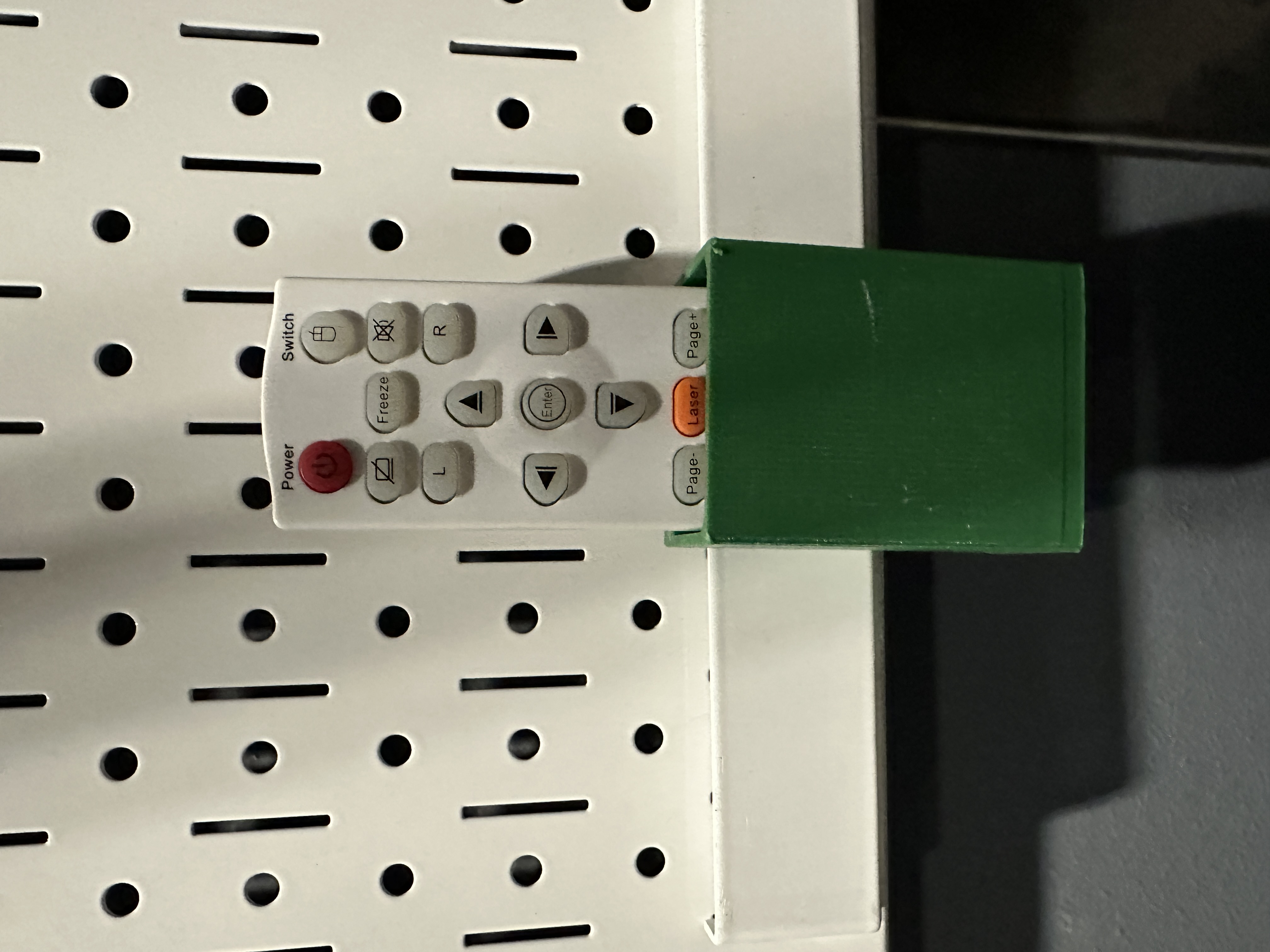 Wall control remote holder