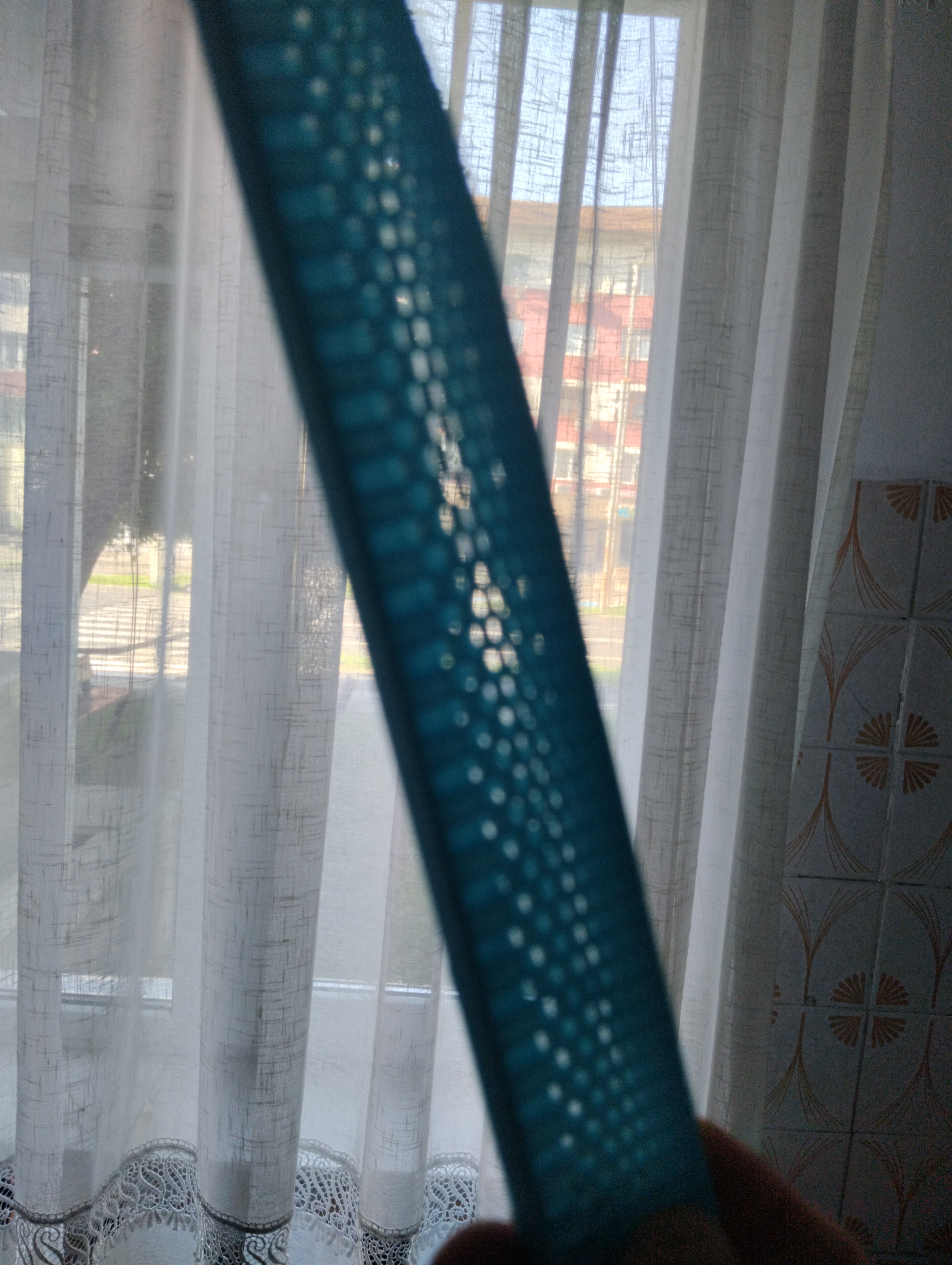 Knife blade sheath with vent to evaporate the water remaining on the blade