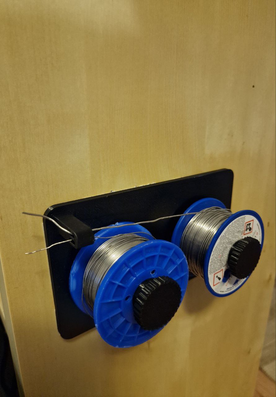 Wall mounted solder spool holder by Firecactus Download free STL