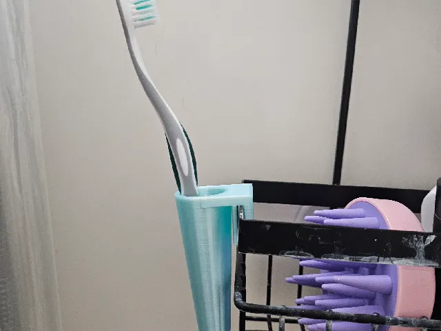 Shower caddy tooth brush holder