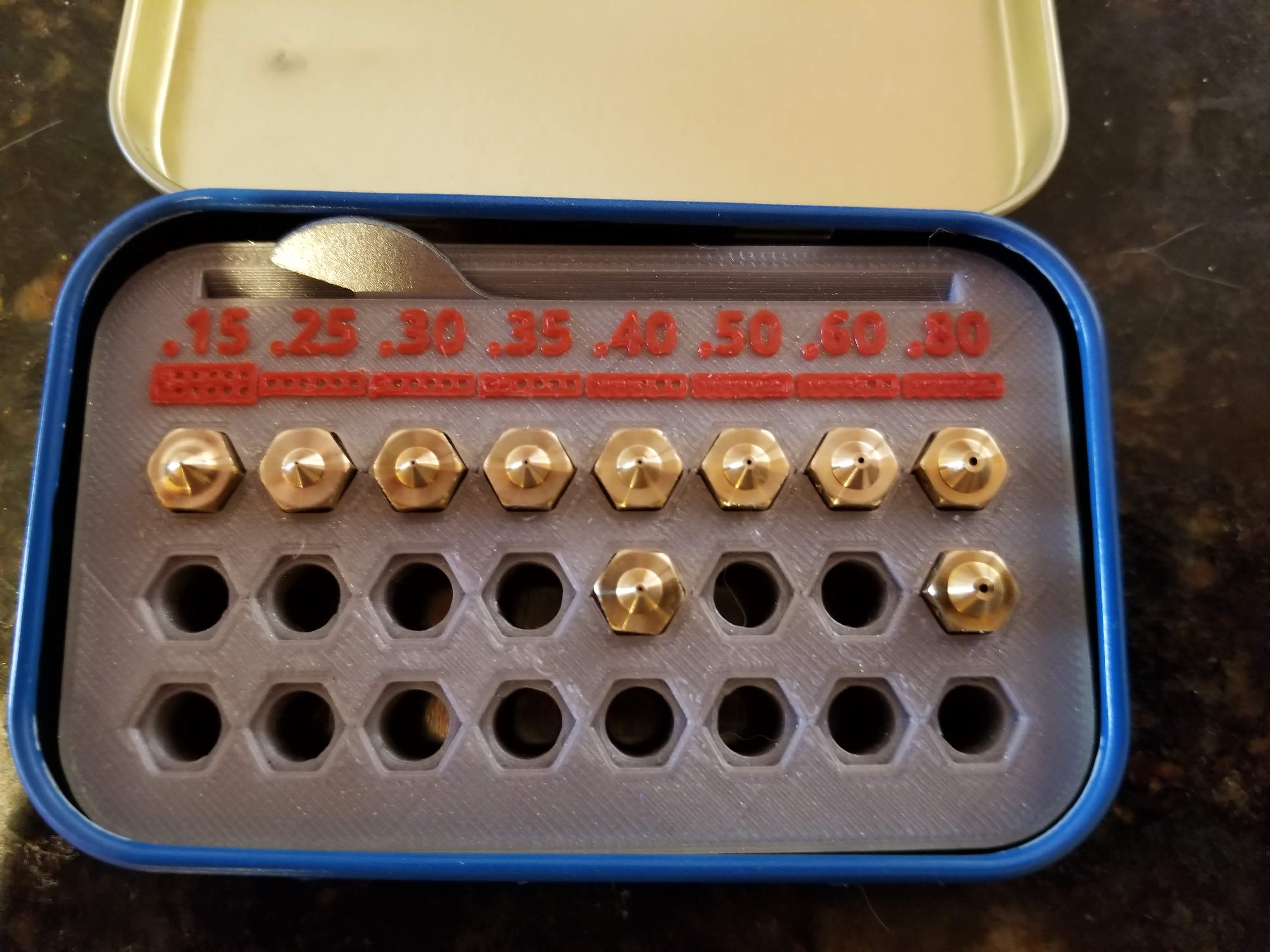 Nozzle Holder in an Altoids Tin, with Tool
