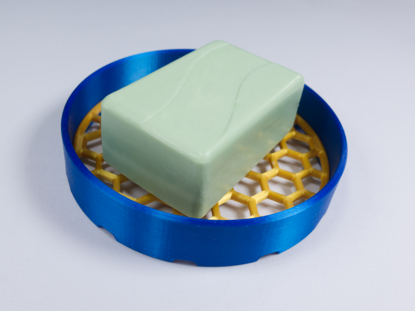 Soap holder with exchangeable bottom
