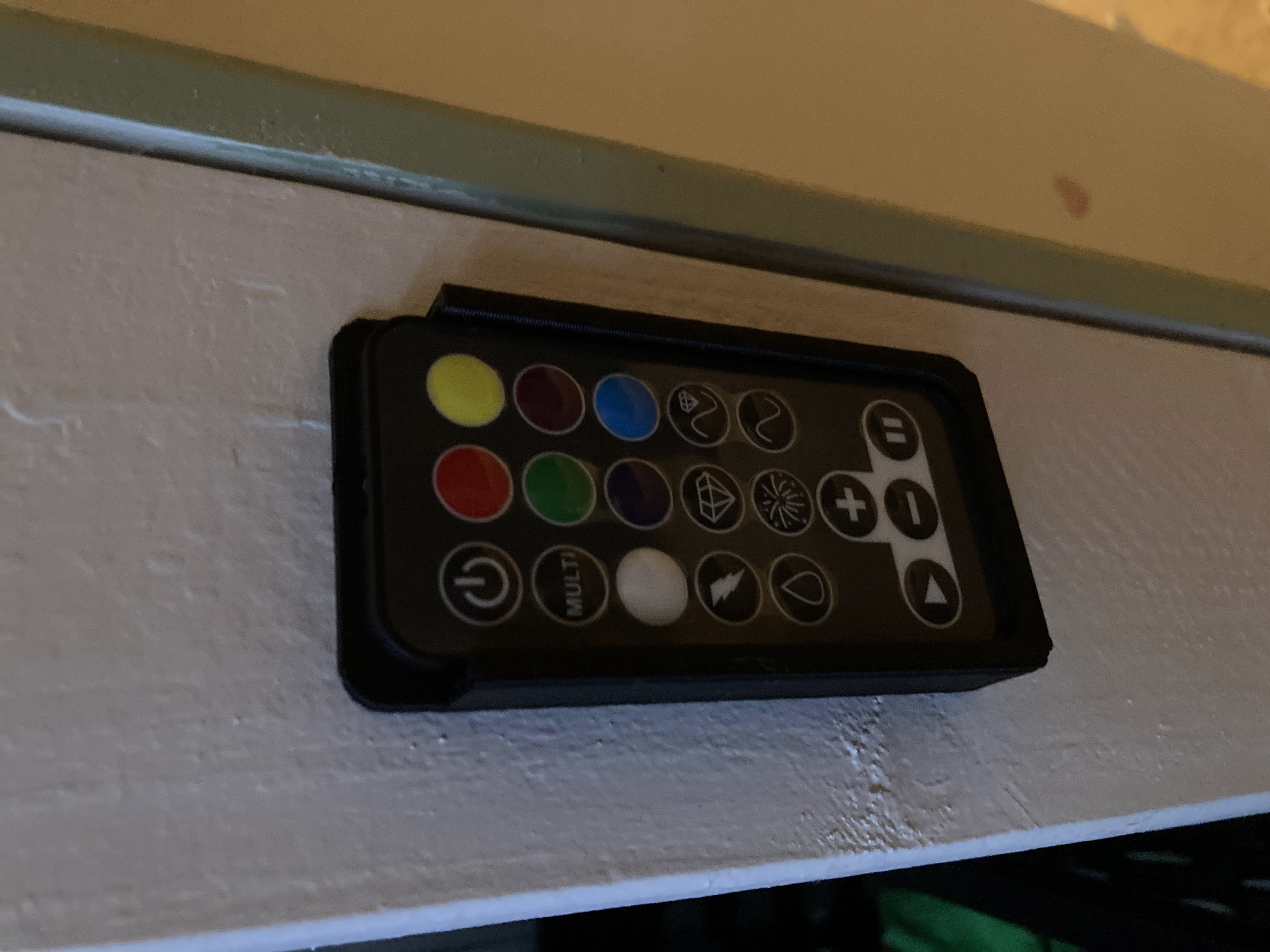 Remote holder for LED light strip