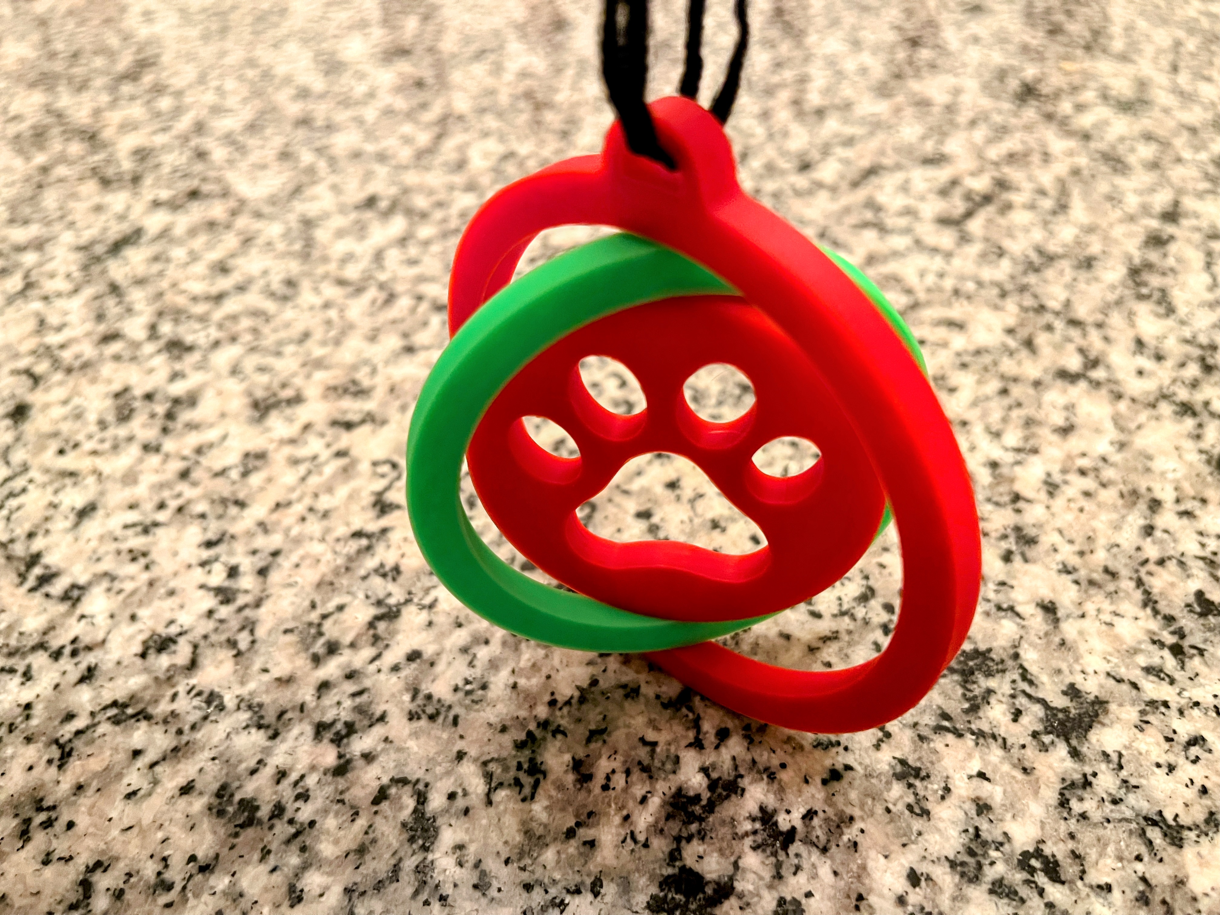 Dog Paw Rotating Christmas Ornament