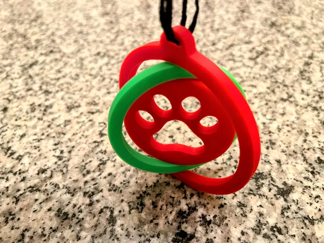 Dog Paw Rotating Christmas Ornament