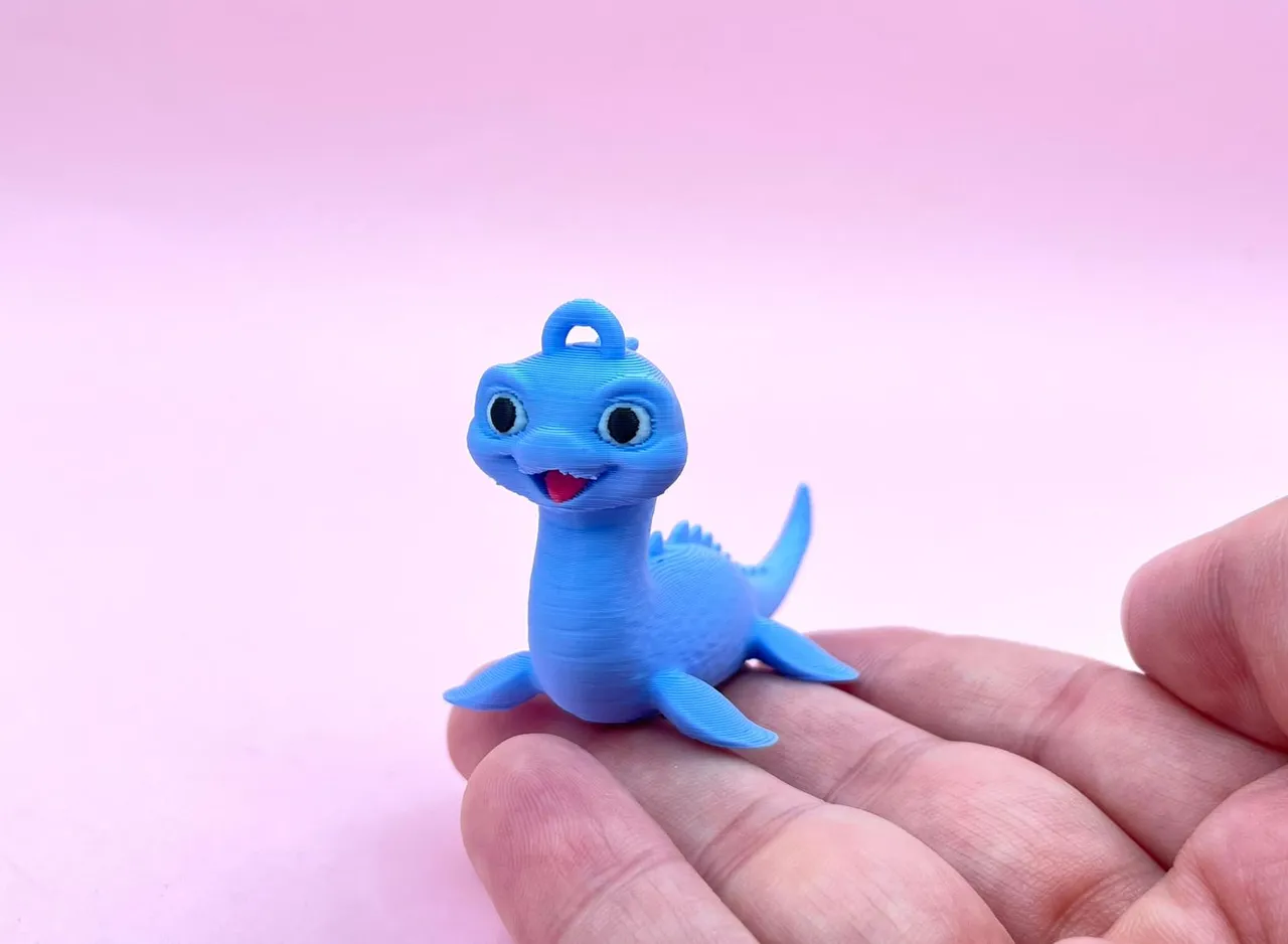 Baby Loch ness monster flexi toy keychain ornament by Rei Bau
