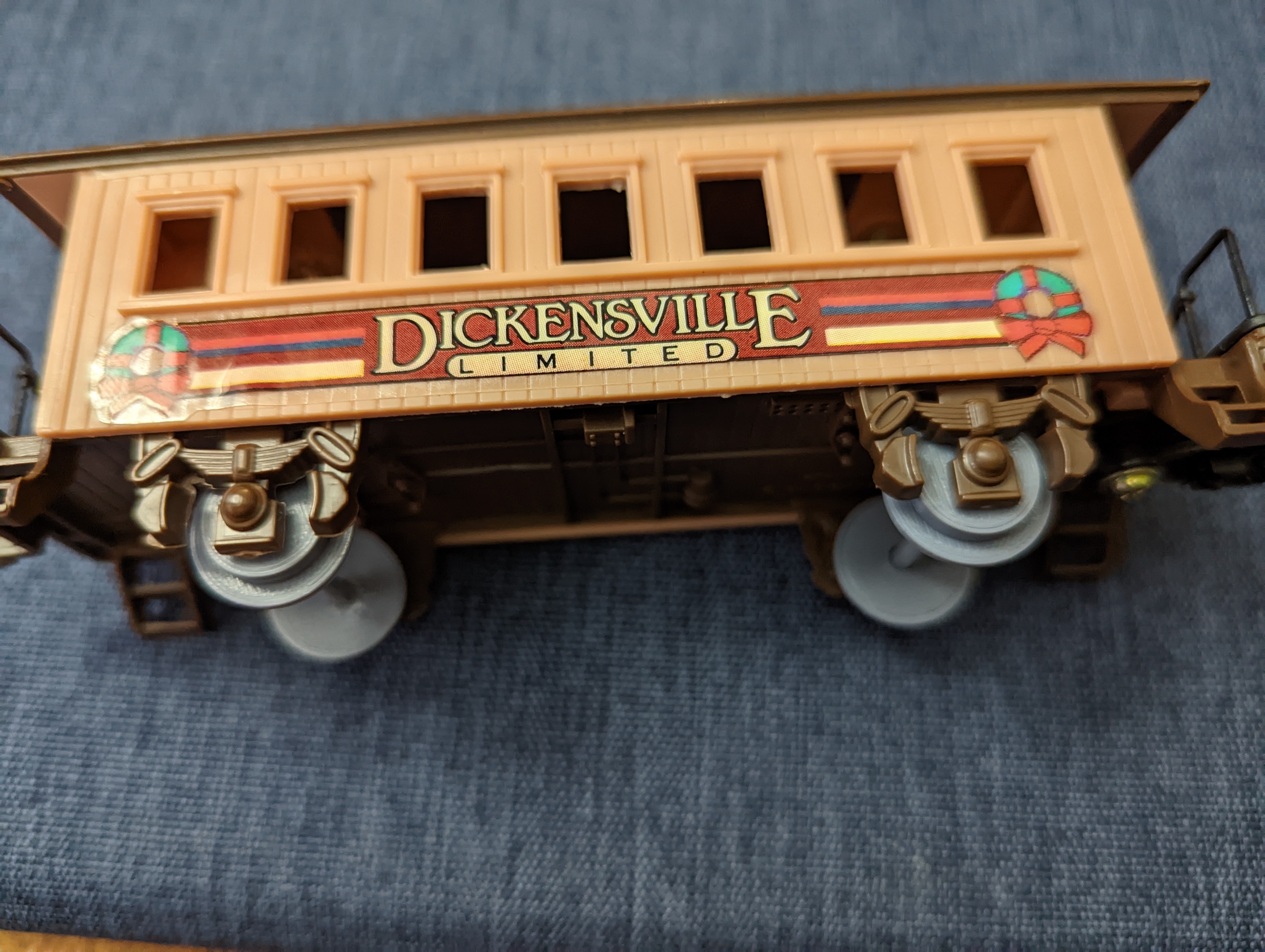 Replacement model train wheel and axle