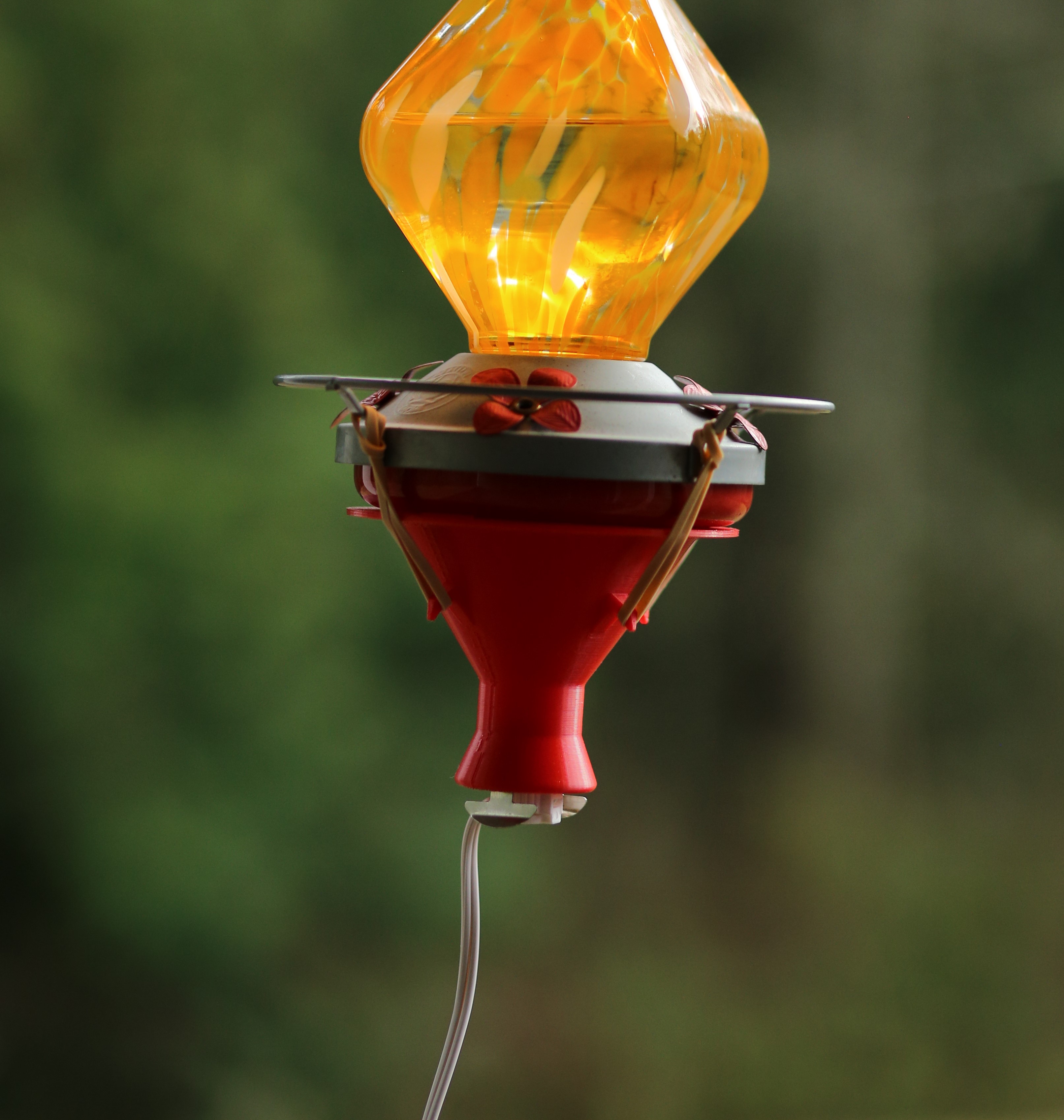 Hummingbird Feeder Heater Remix, Rubber band attachment by Eric