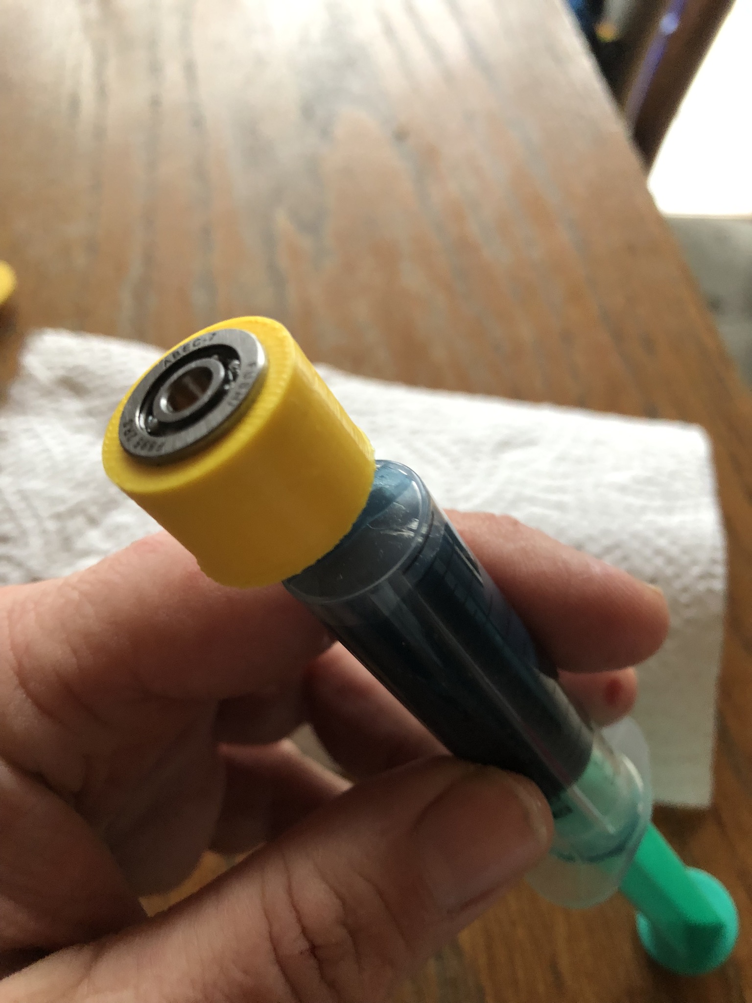 Greasing tool for F695 bearing