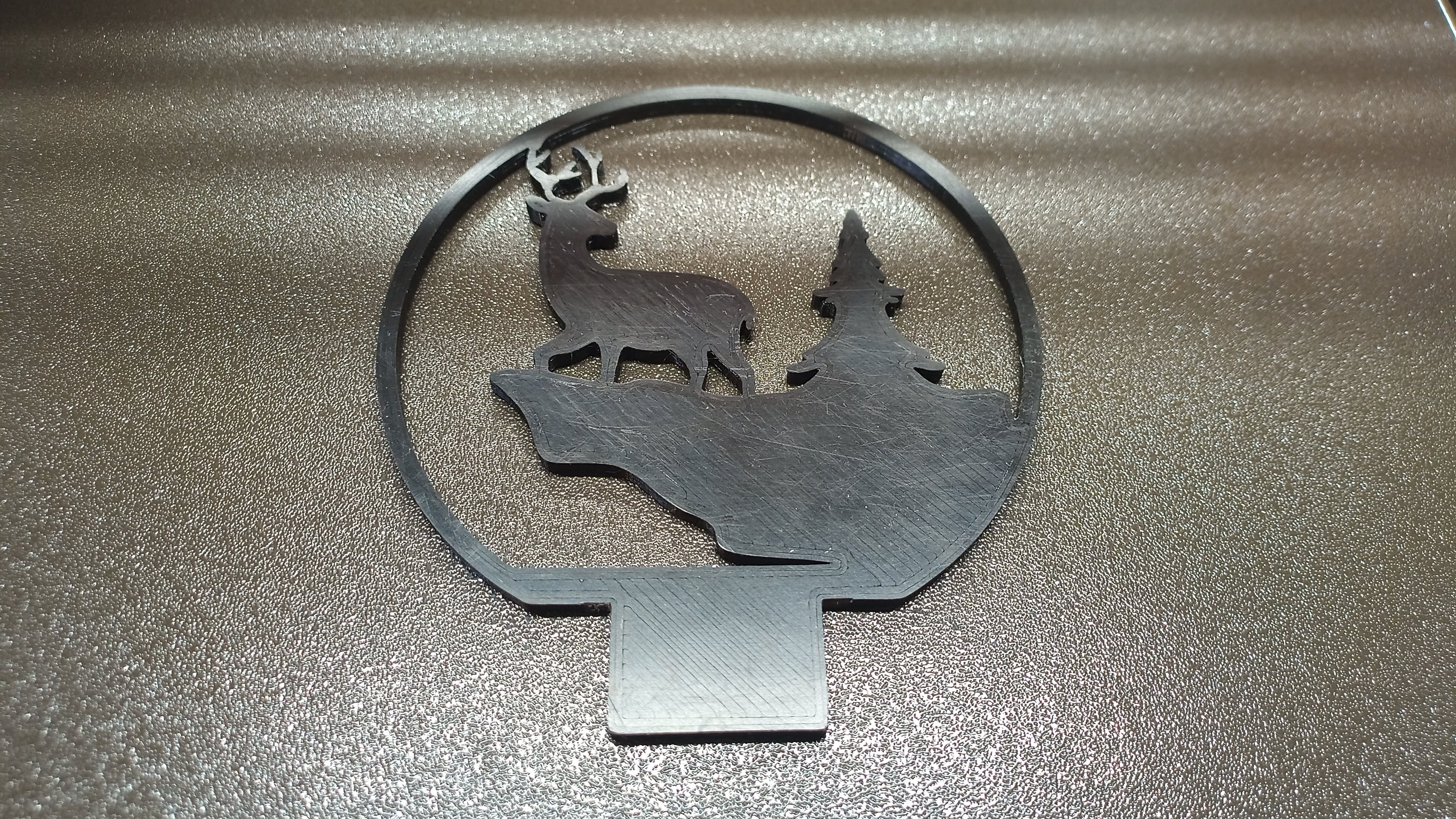 Snowglobe plate remix of Reindeer on rock