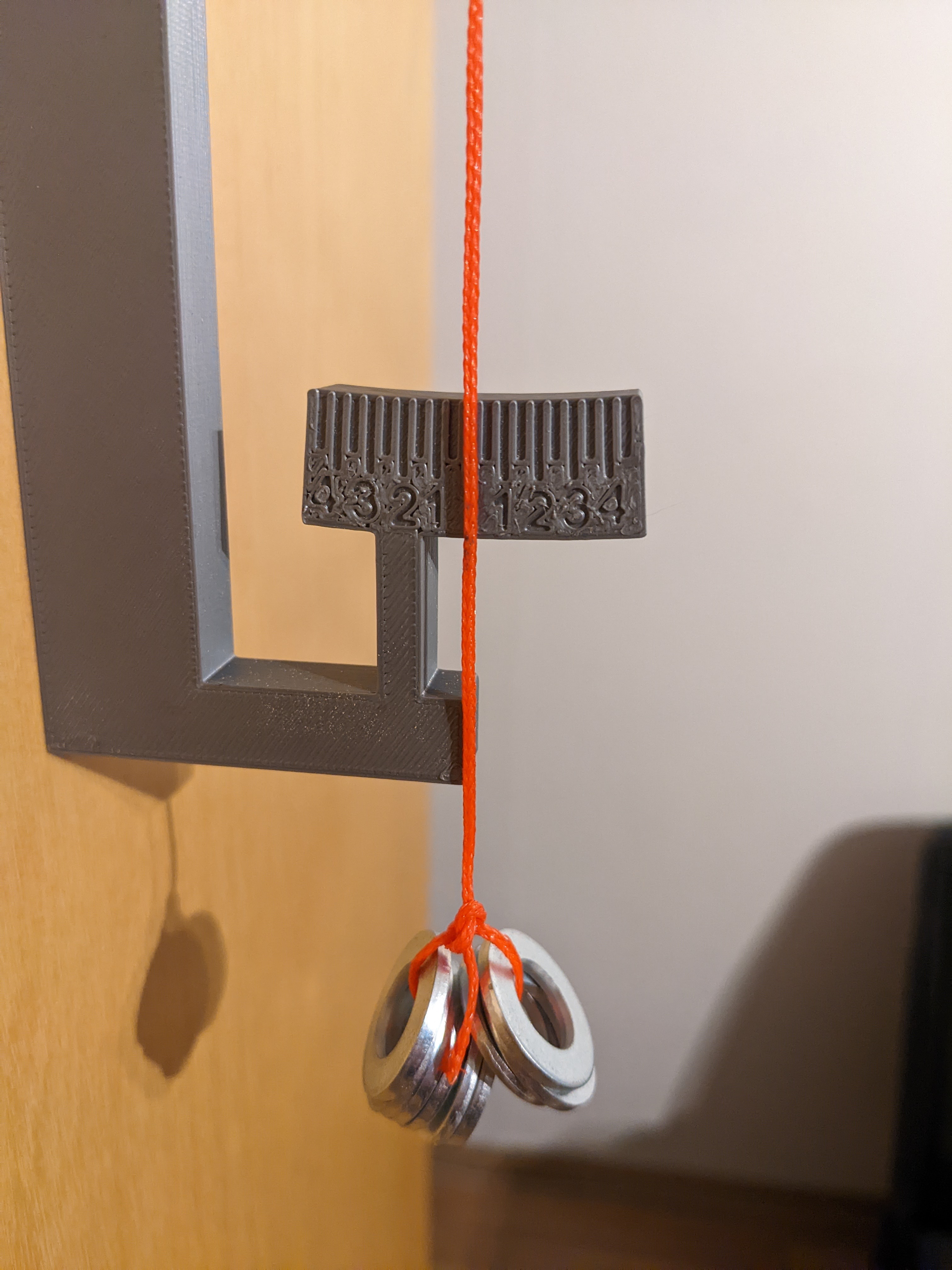 plumb bob with scale