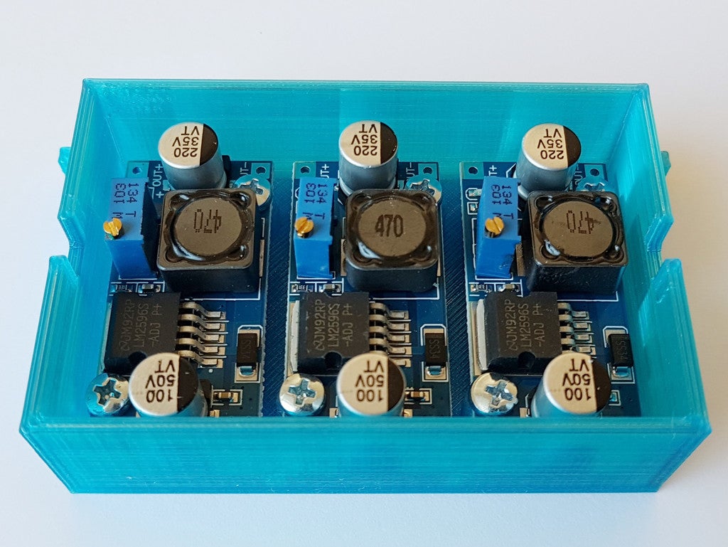 Housing for 3x buck converters for Raspi and fan supply on 3D printer